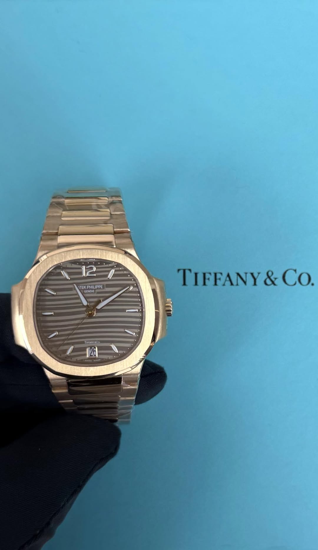 May be an image of wrist watch and text that says '12 VTEKPHLIPPE GINEVE - TIFFANY&CO Co. & ل'