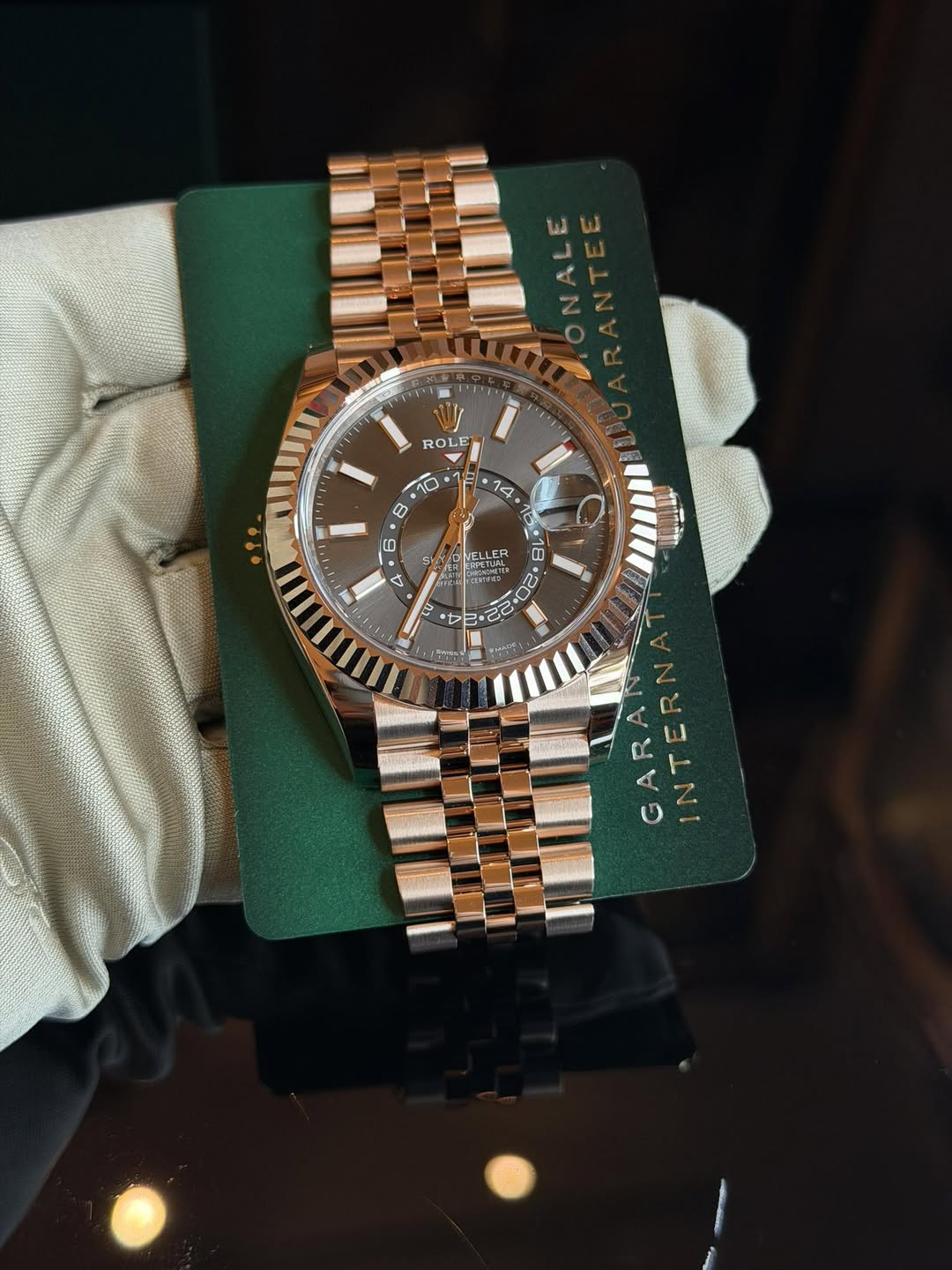 May be an image of wrist watch and text