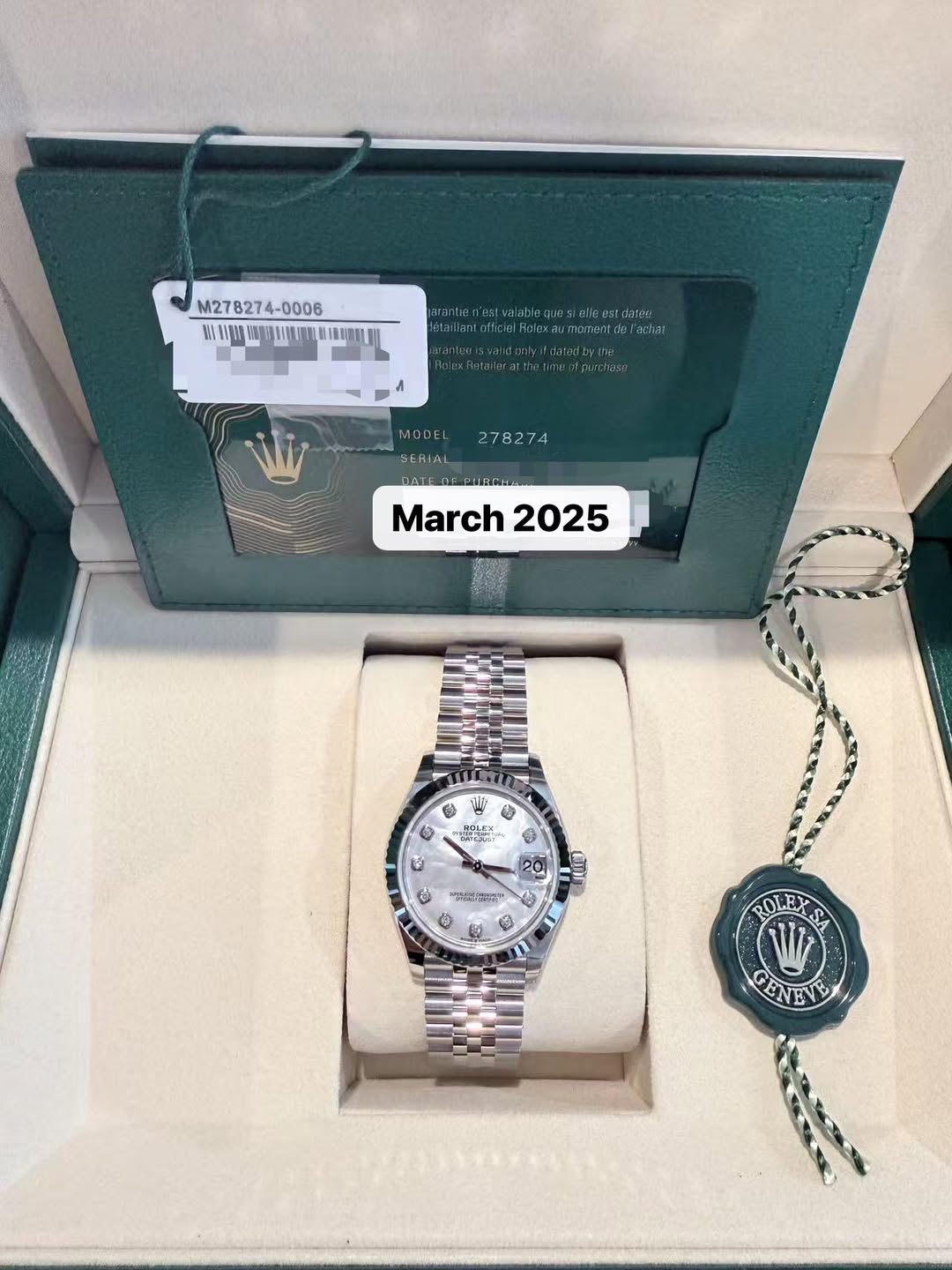 May be an image of wrist watch and text