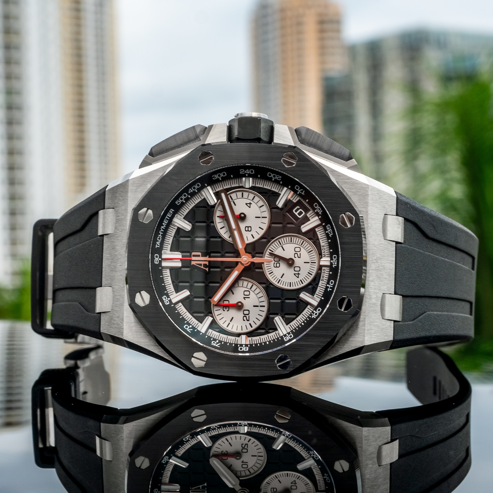 May be an image of wrist watch and text