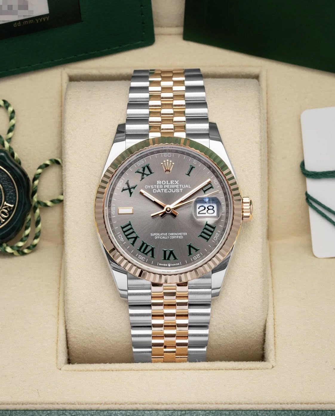 May be an image of wrist watch and text