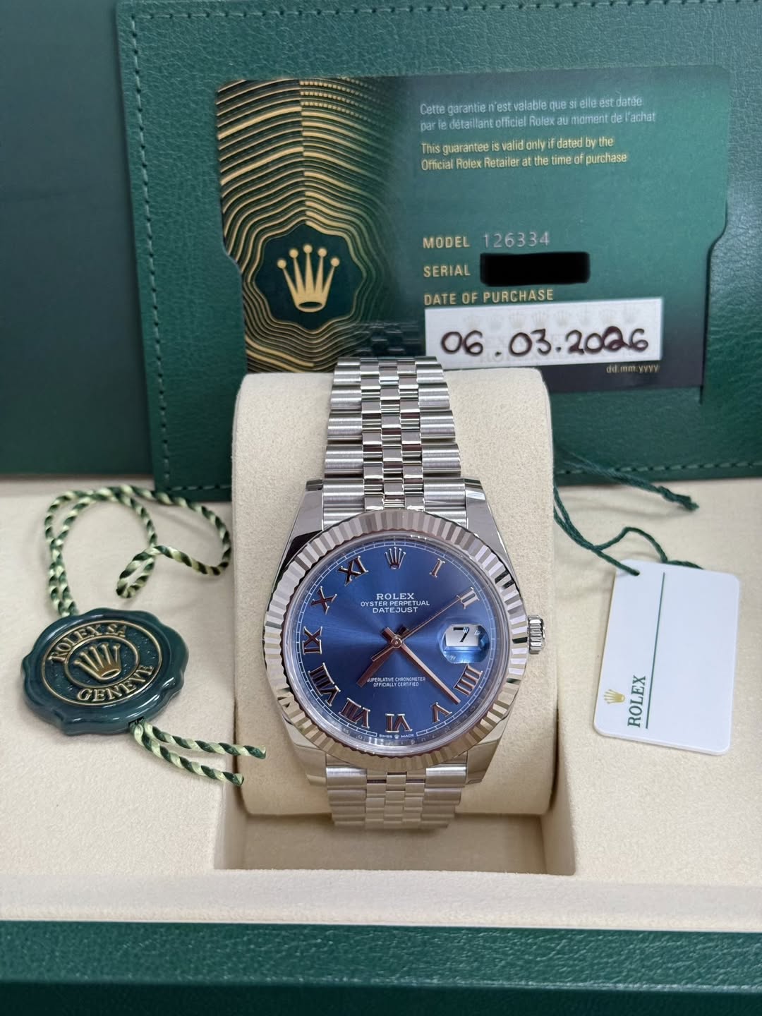 May be an image of wrist watch and text that says 'Cetta garantie fest valab/e ues elle est datée par detavilant officiel Rulex momant tde achat This guarantee valid nyil datad…