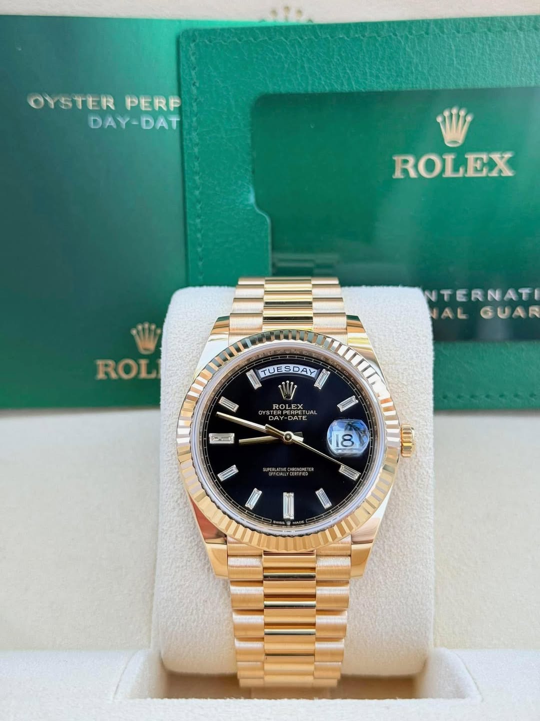 May be an image of wrist watch and text that says 'OYSTER PERP DAY-DAT ROLEX ROL TERNAT AL ALGUAR GUAR TUESDAY ល2 ROLEX 15 DAY AY-DATE -DATE ሀህረስ UaU 18 黑 الال S I'