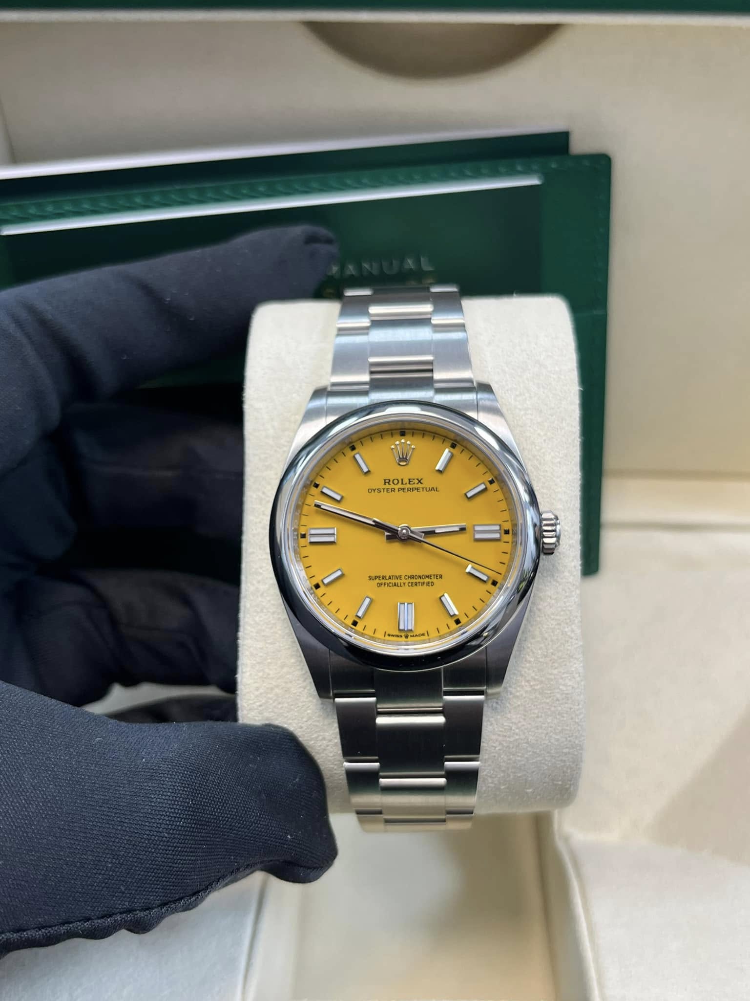 May be an image of wrist watch and text