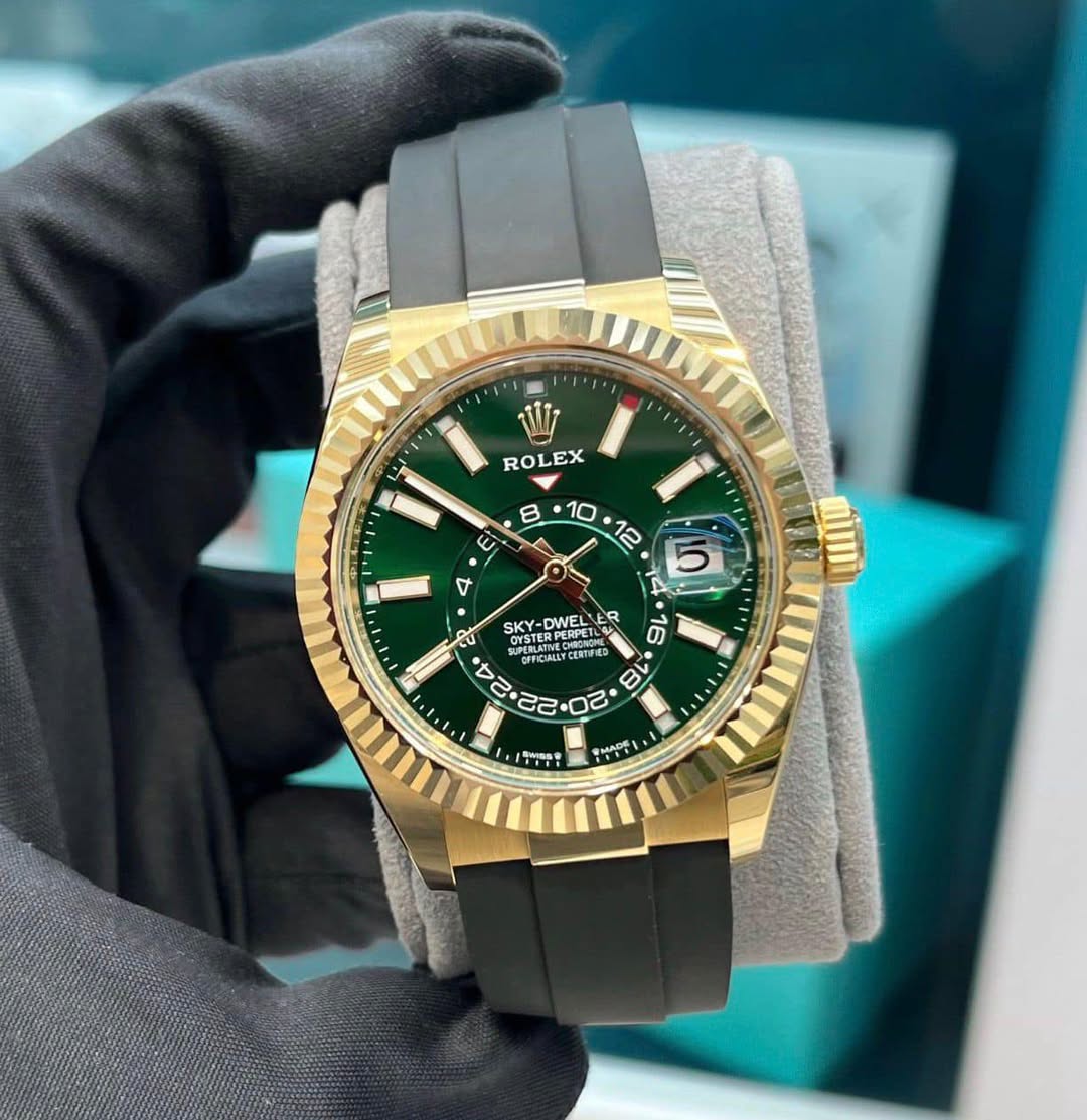 May be an image of wrist watch and text