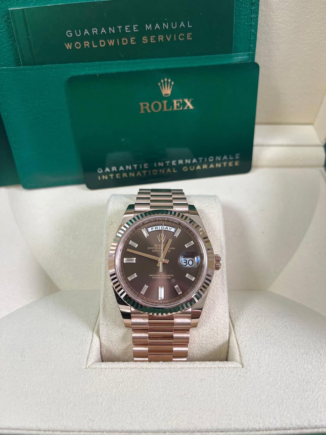 May be an image of wrist watch and text