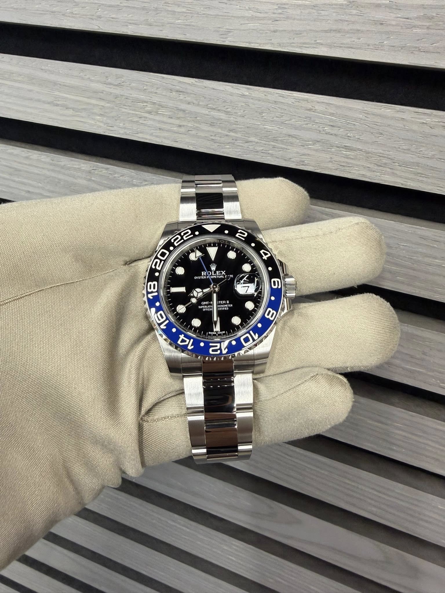 May be an image of wrist watch and text