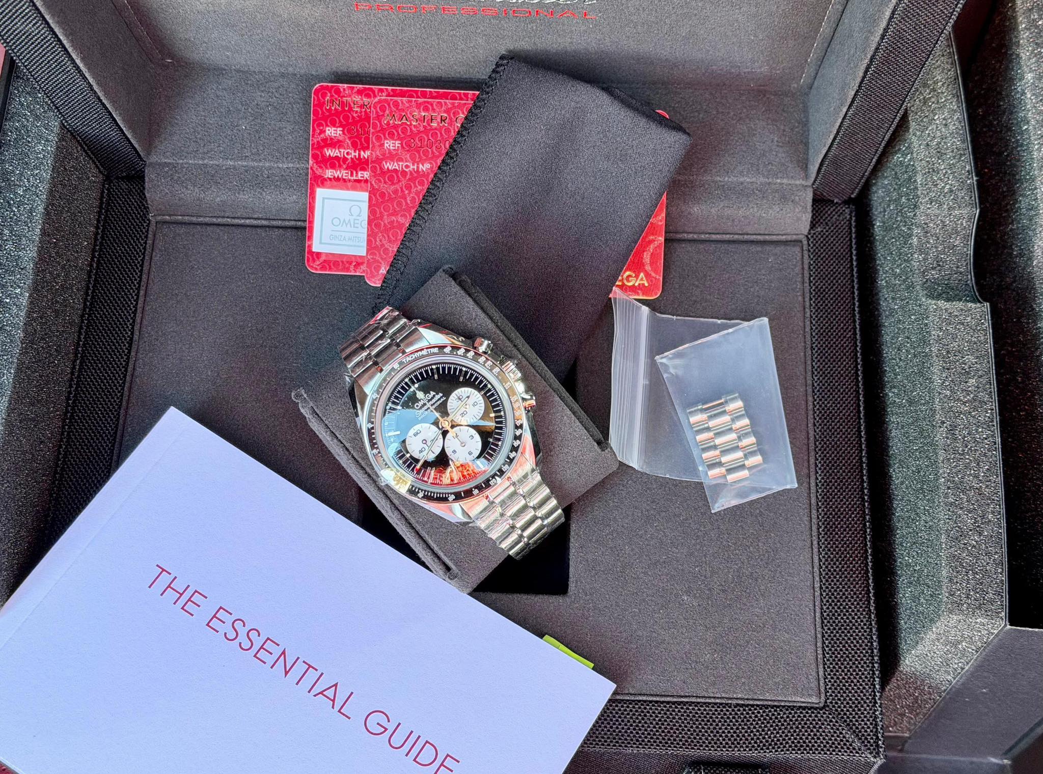 May be an image of wrist watch and text