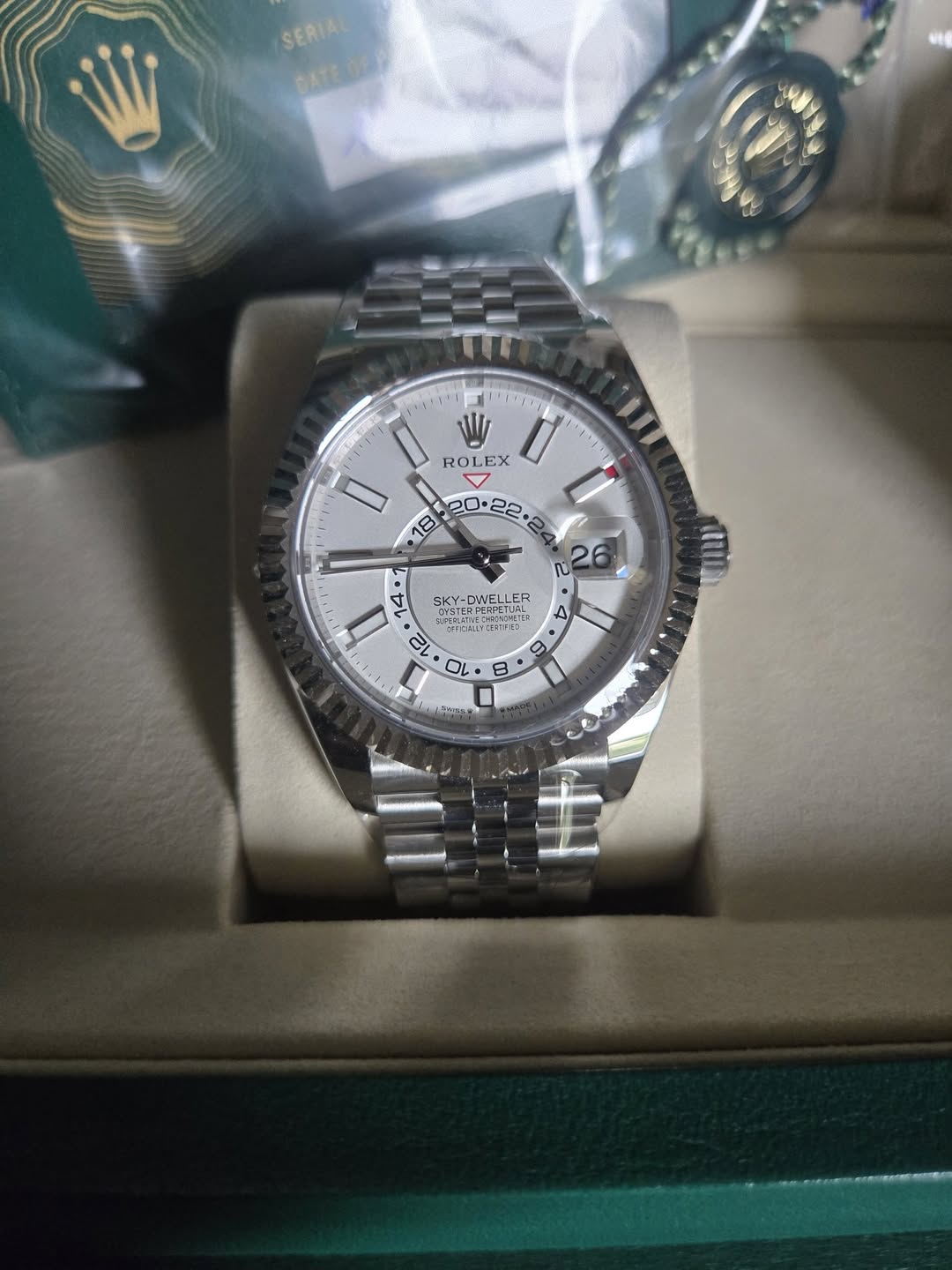 May be an image of wrist watch and text
