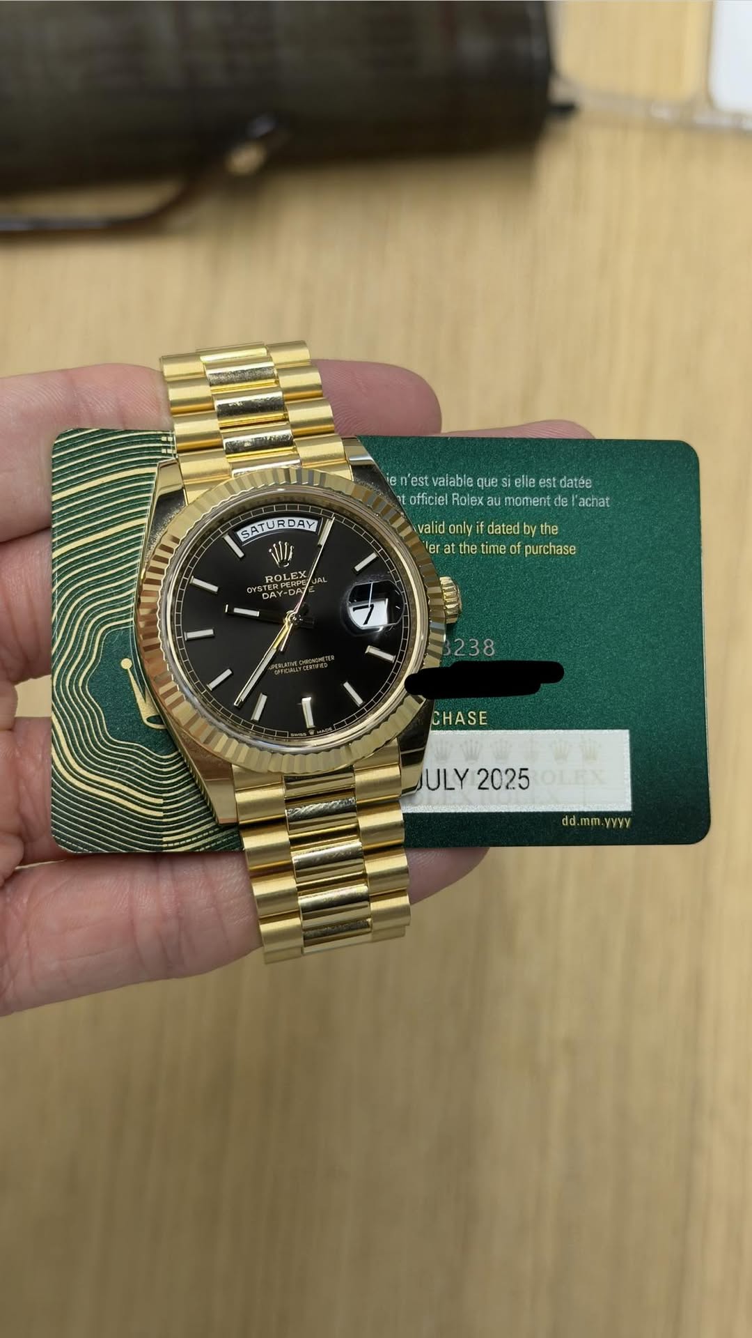 May be an image of wrist watch and text