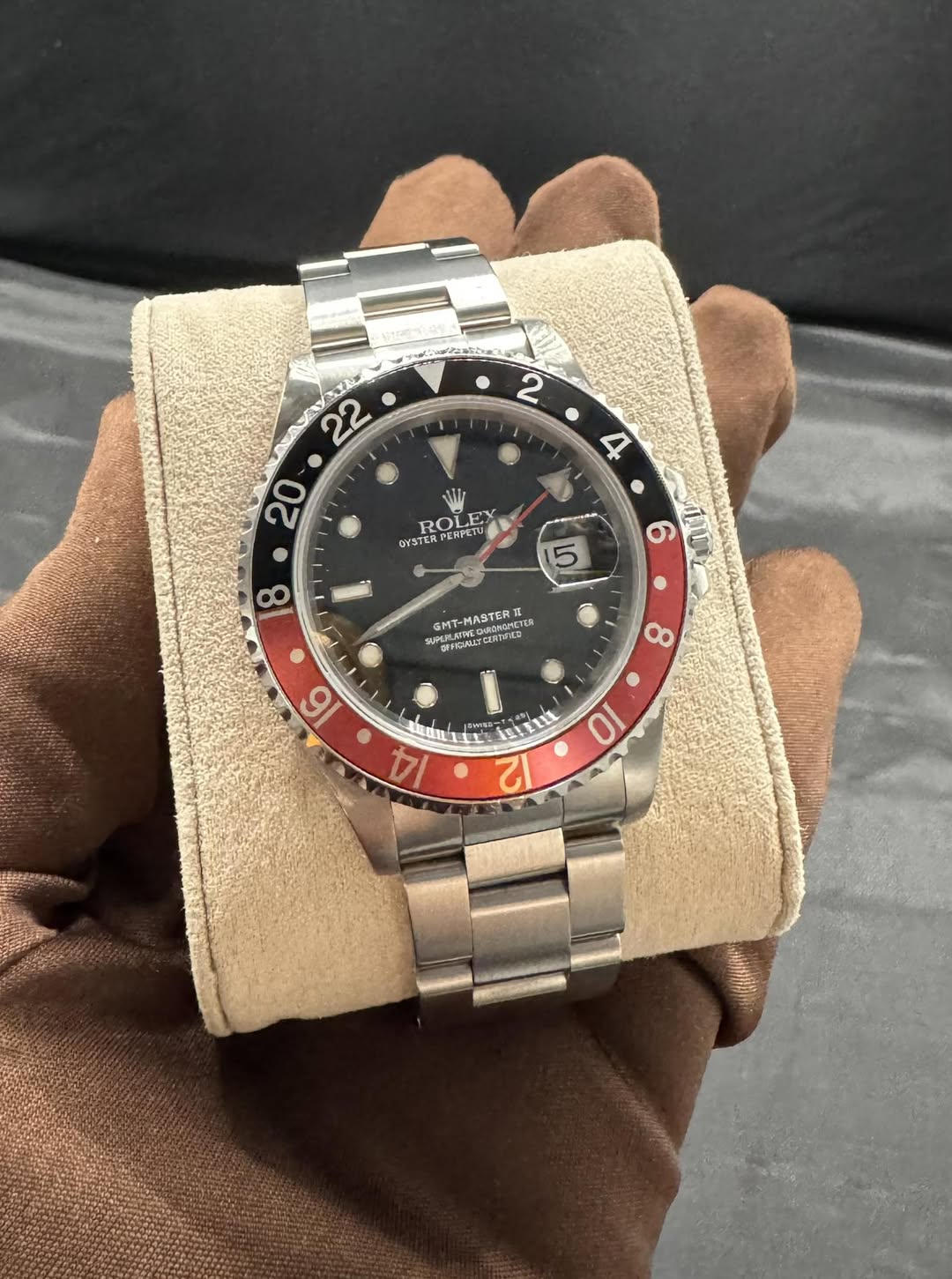 May be an image of wrist watch and text