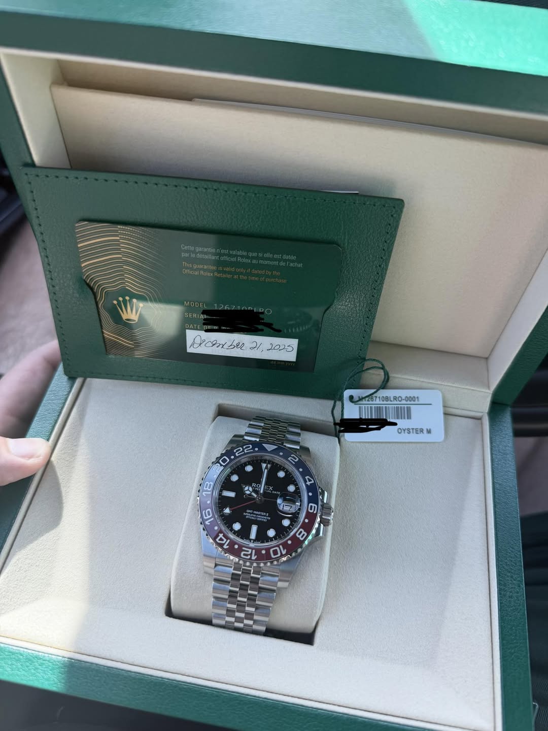 May be an image of wrist watch and text
