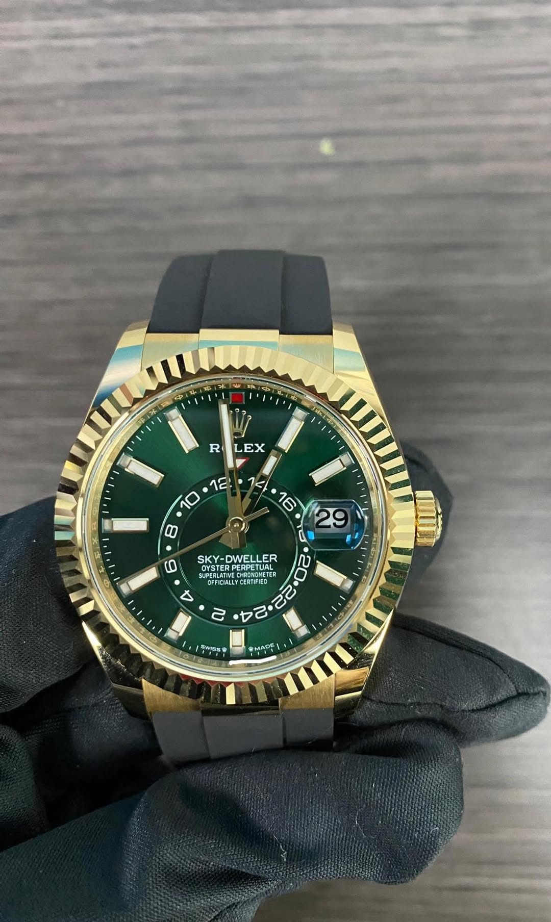 May be an image of wrist watch and text