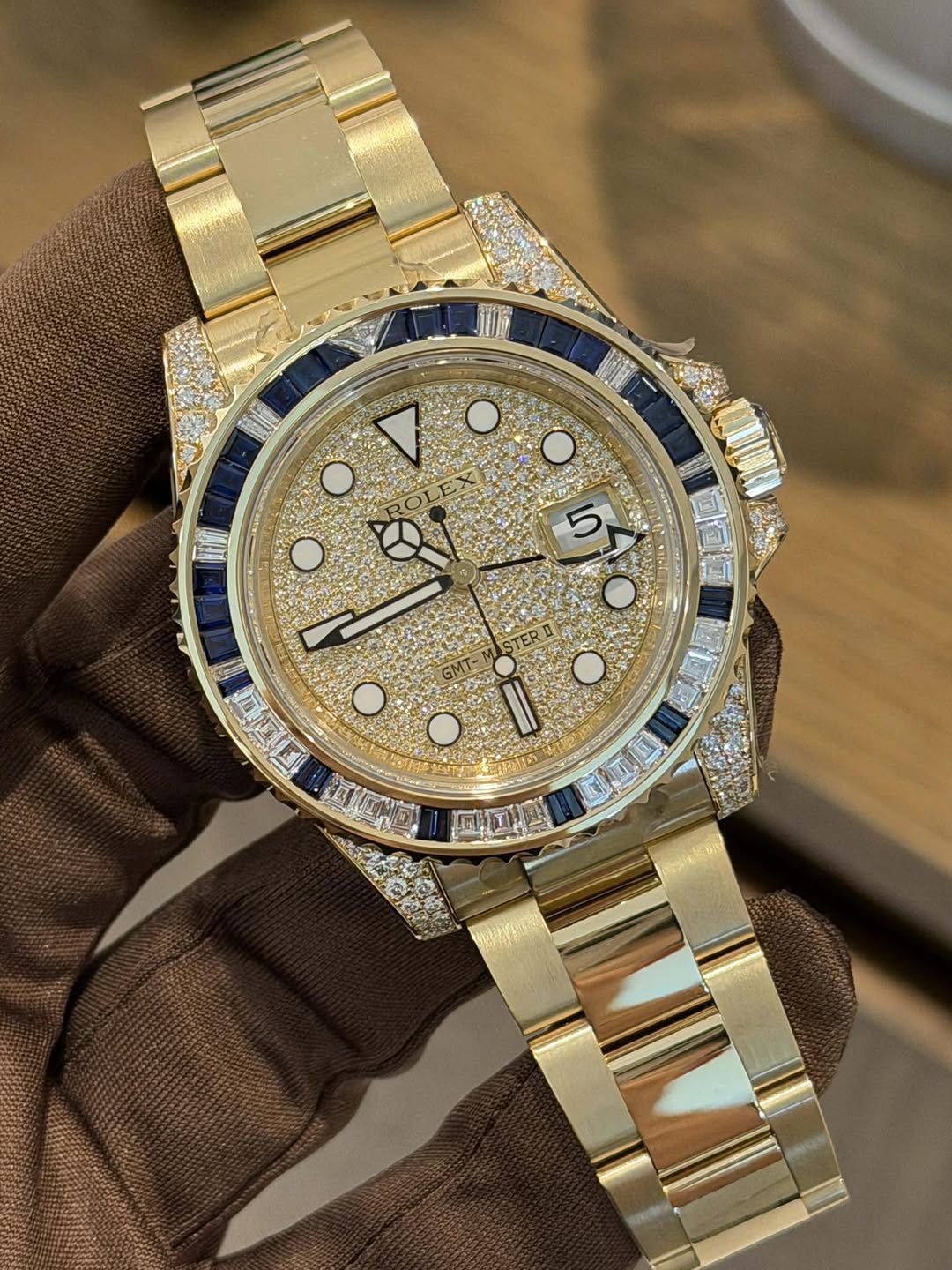 May be an image of wrist watch and text