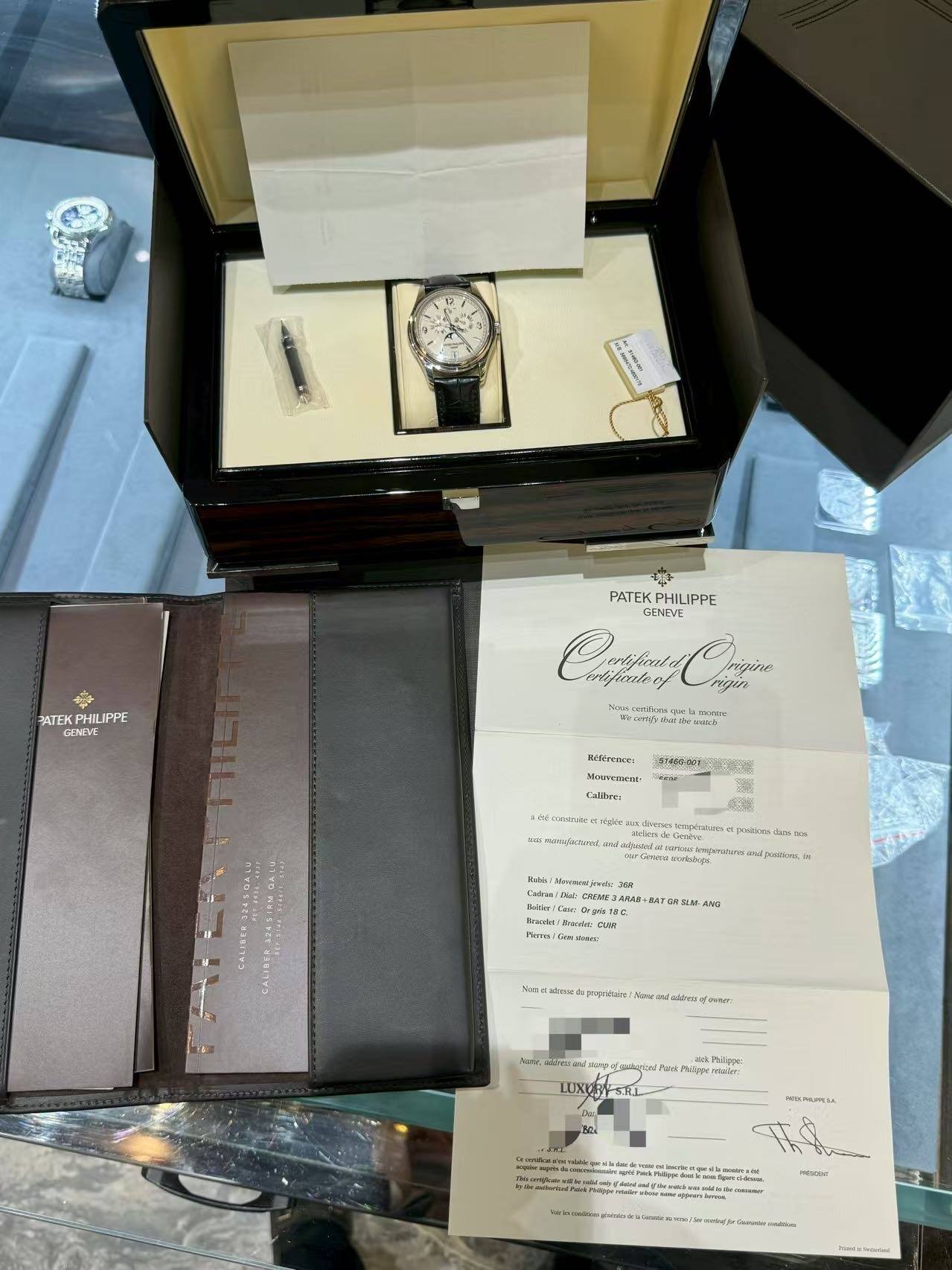 May be an image of wrist watch and text