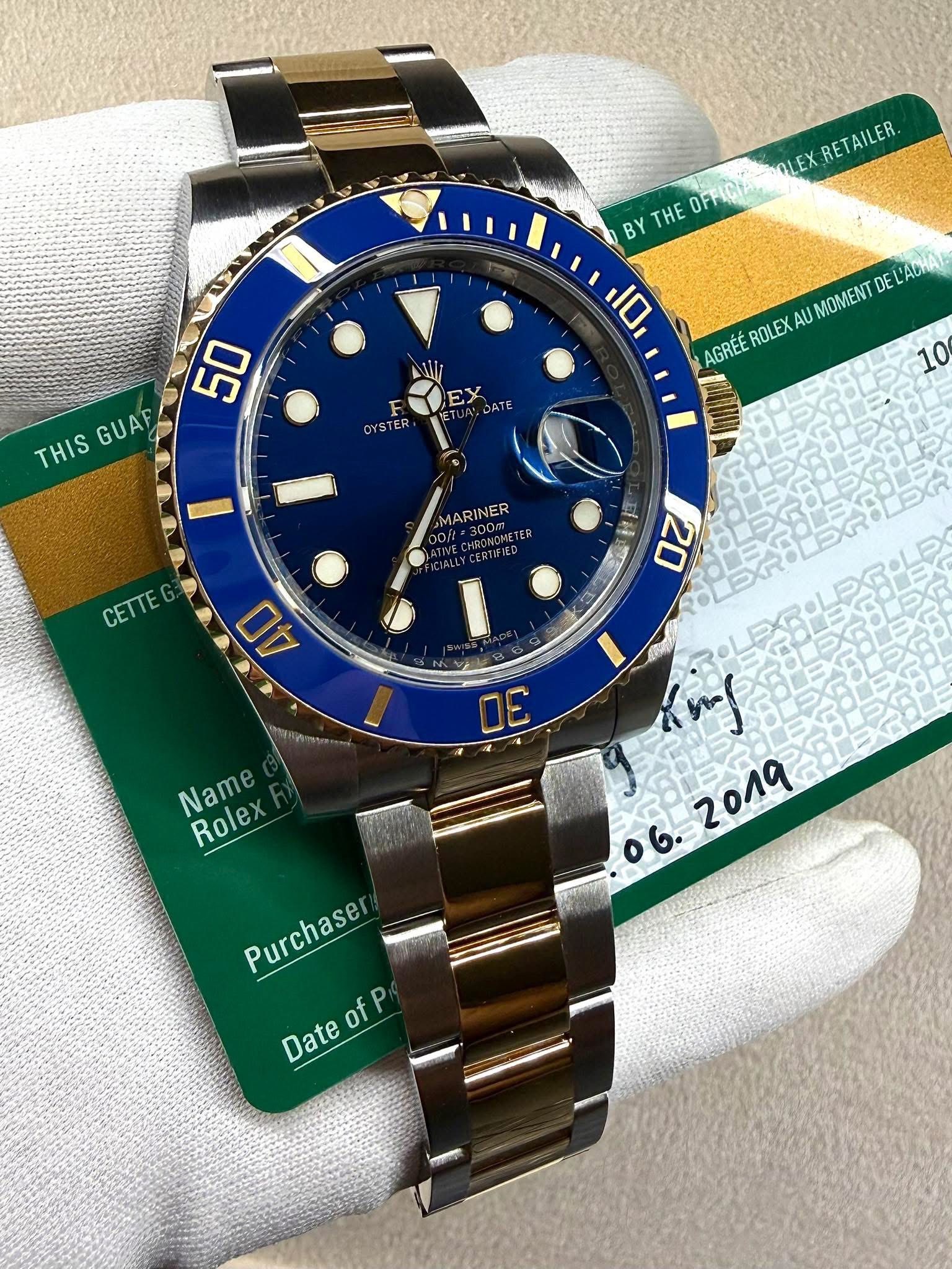 May be an image of wrist watch and text that says '2 OLEX RETAILER BY THE OFFICIAN OFF 50 10 THIS GUAF ROLEX AU MOMENT DEL L'ACHAA AGREE EX R OYSTER 10 MARINER 00ft ONDMETER ETER…
