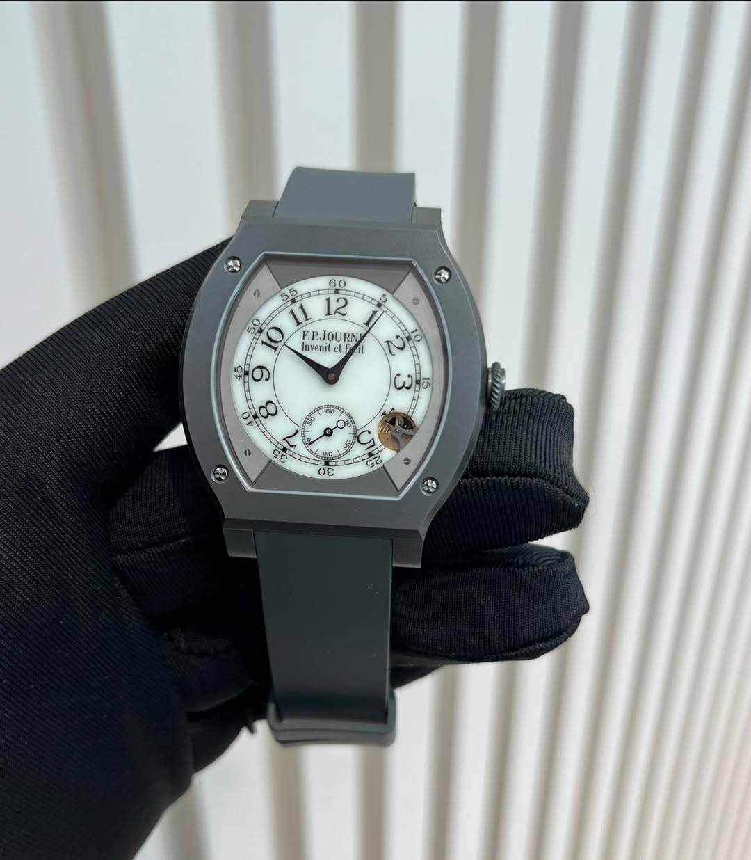 May be an image of wrist watch and text