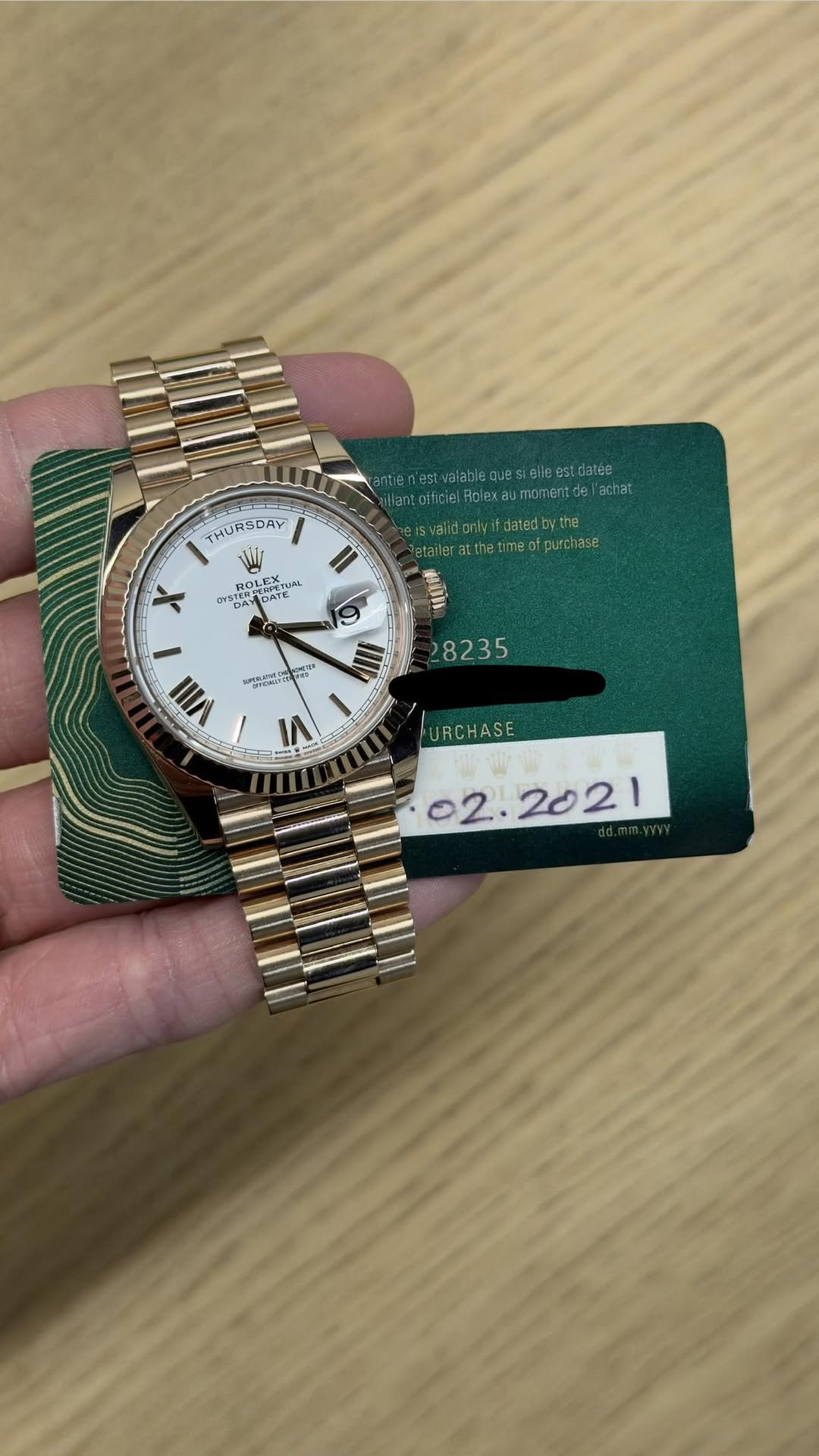 May be an image of wrist watch and text