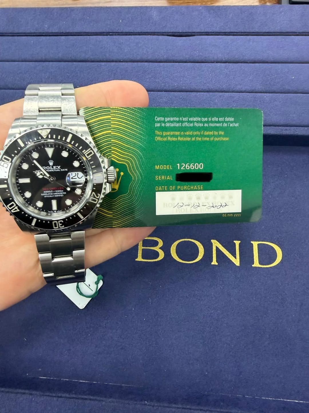May be an image of wrist watch and text that says 'Catta garantie Cartagaratee est valableque sielle datée per| detaill ntortciel Rglex momentde l'achar れ บลลก walid anly dated…