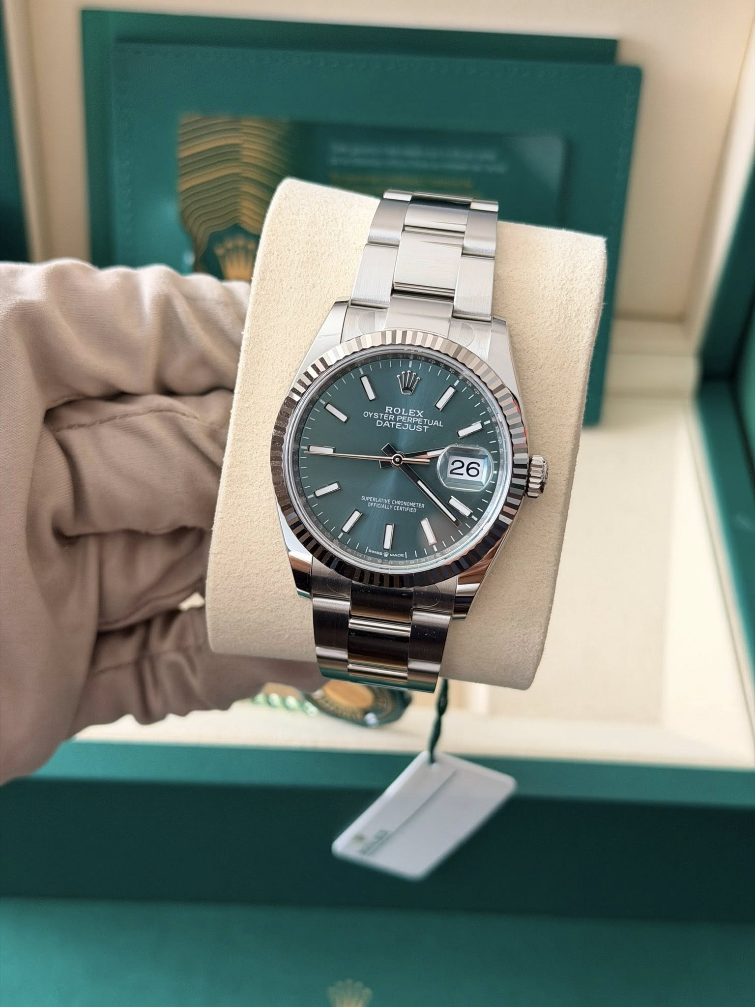 May be an image of wrist watch and text