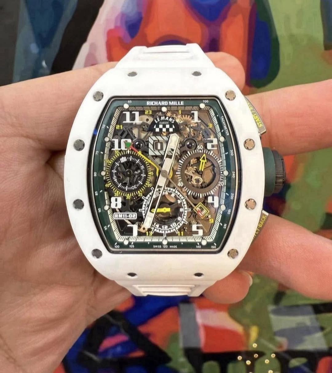 May be an image of wrist watch and text