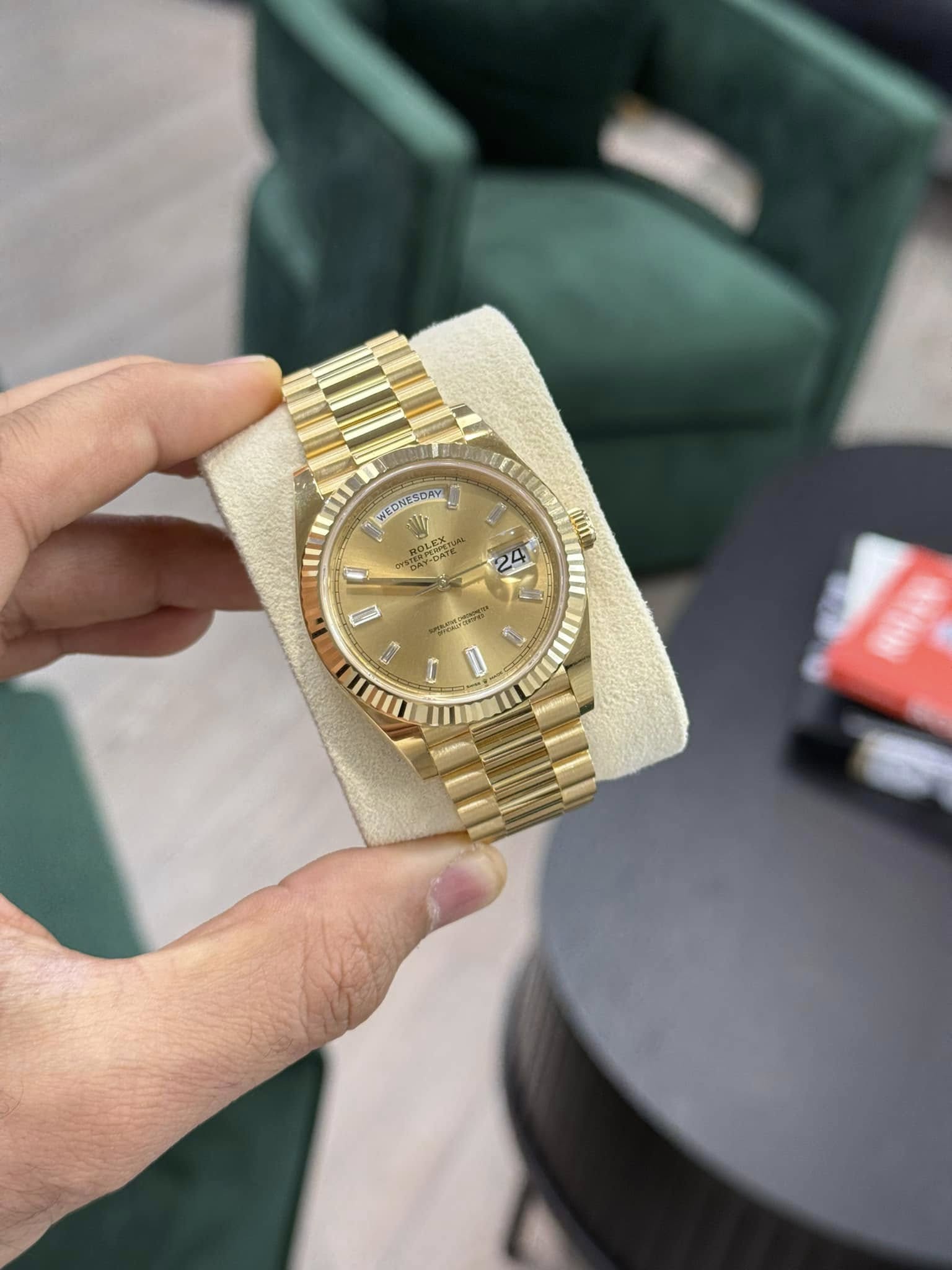 May be an image of wrist watch and text