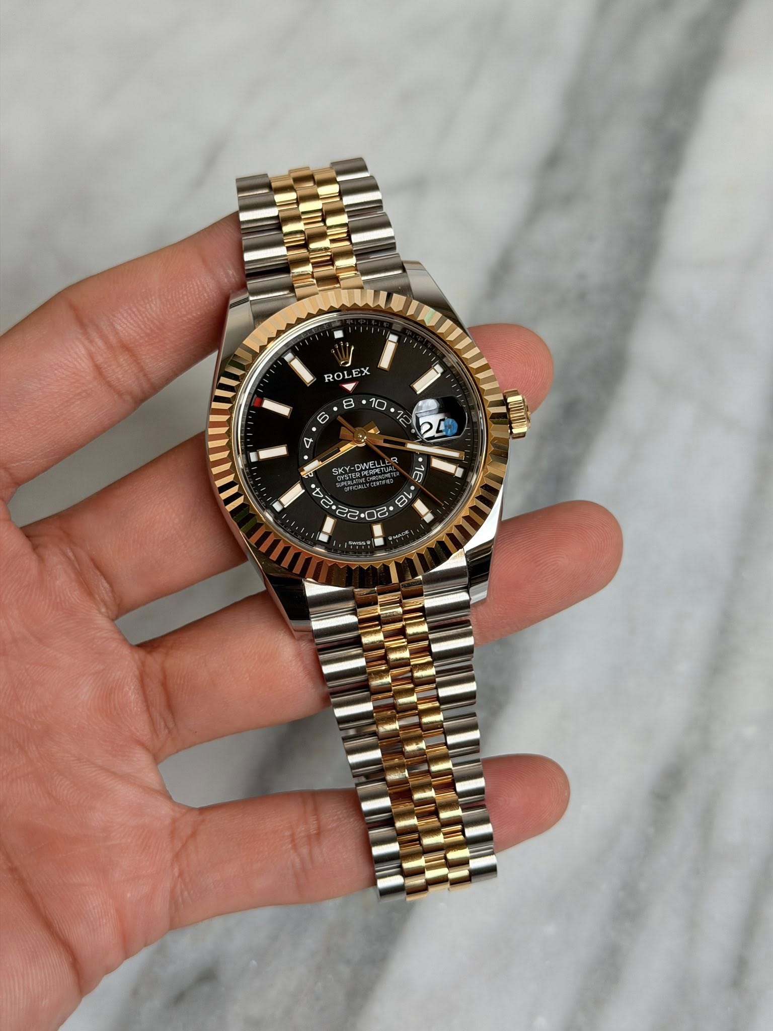 May be an image of wrist watch and text that says '- i ROLEX x ROL 8 10 6 2 V DWN EL 8 75 mIn ع -'