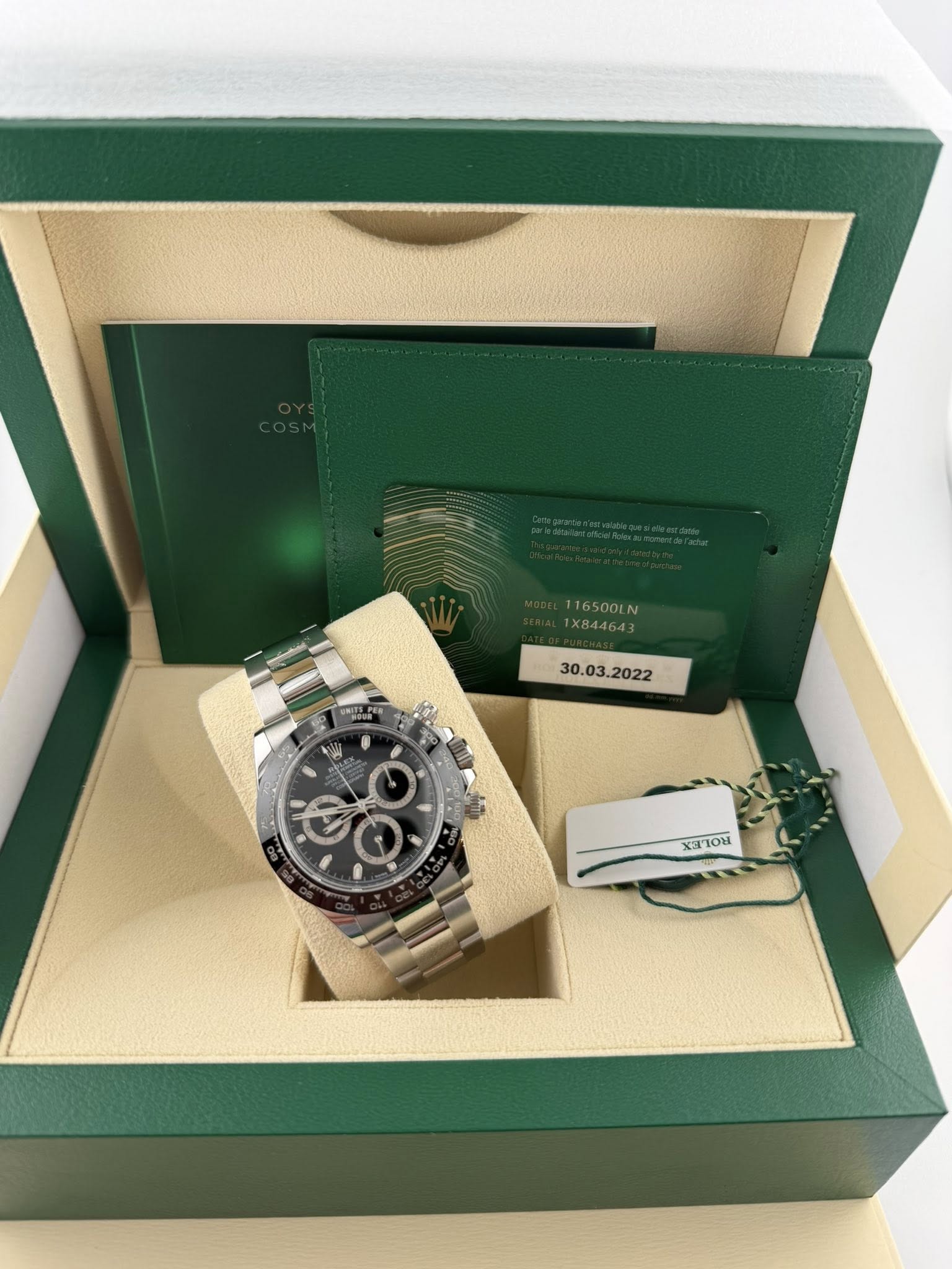 May be an image of wrist watch and text that says '16500LN X844 X844643 GOOD XILIR'