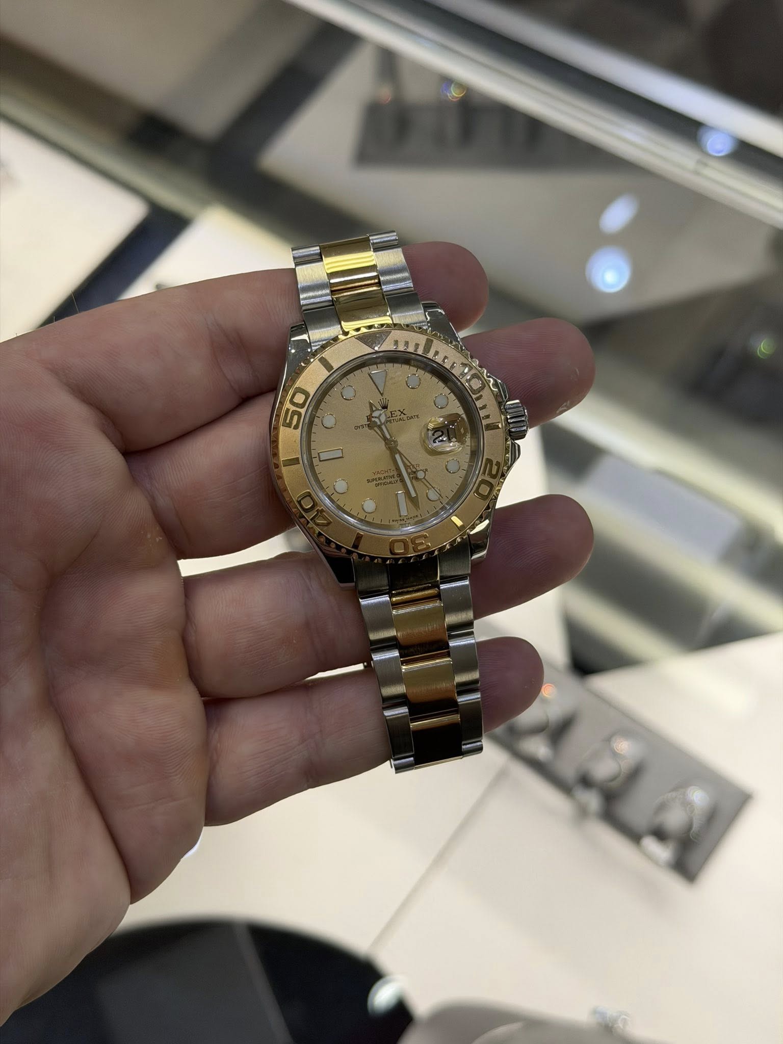 May be an image of wrist watch and text