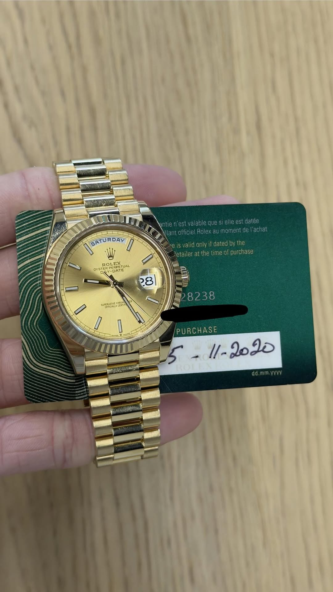 May be an image of wrist watch and text