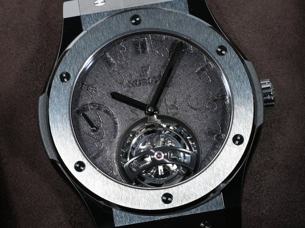 May be an image of wrist watch