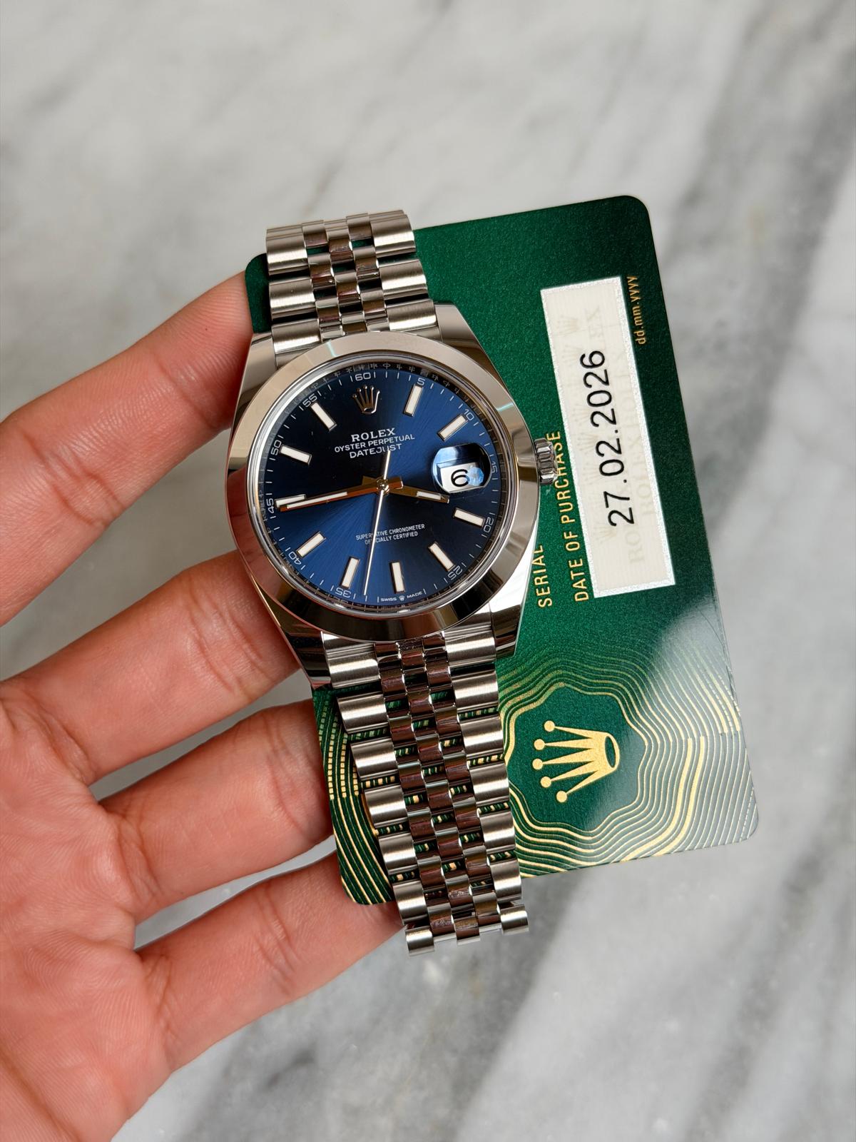 May be an image of wrist watch and text that says 'SD ROLE ROLEX EX PE DA DATE 6 a dd.mm.yyyy PURCHAS . OF SERIAL TEOFPURCHASE 者 DATE S -'
