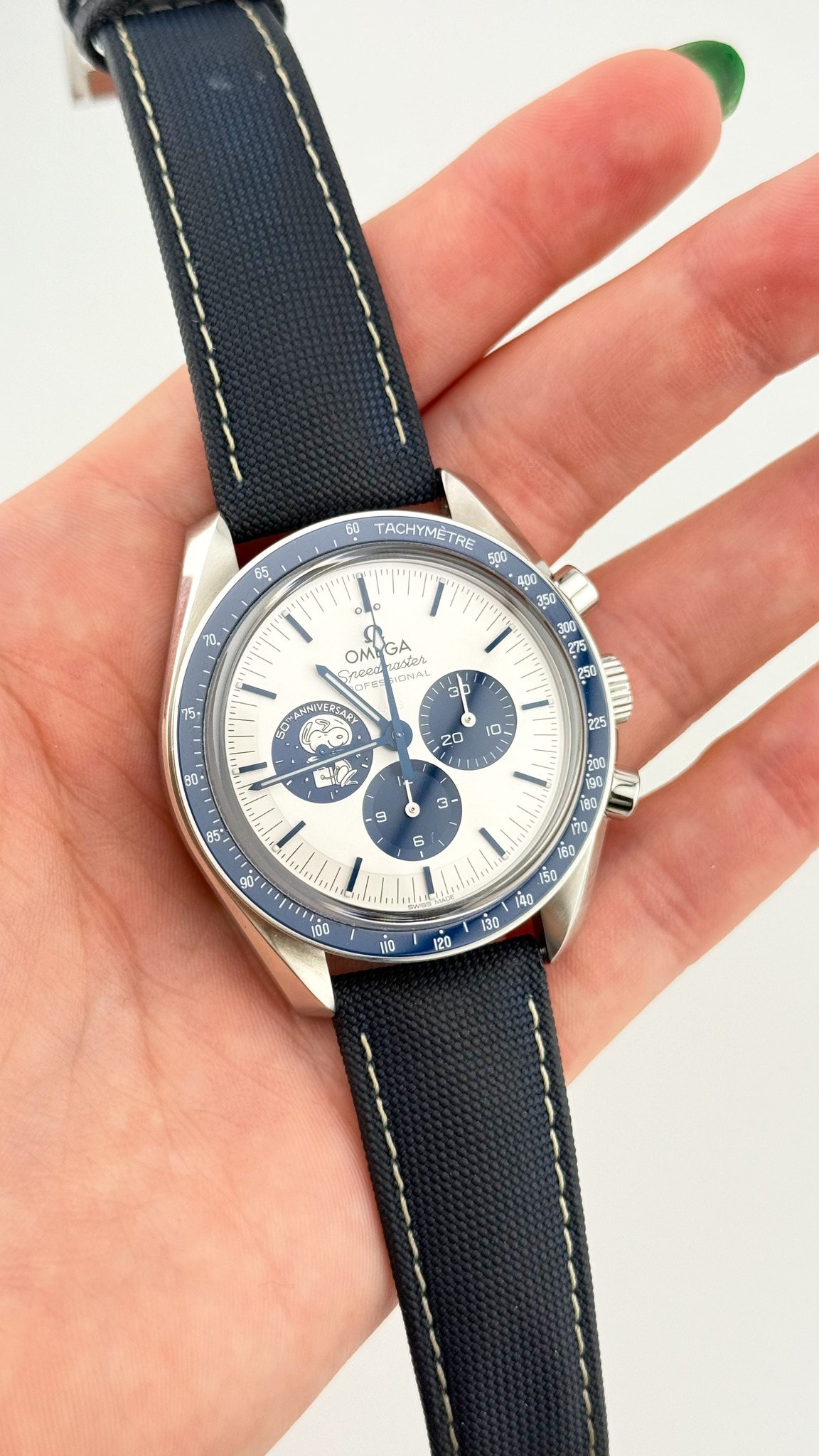 May be an image of wrist watch and text