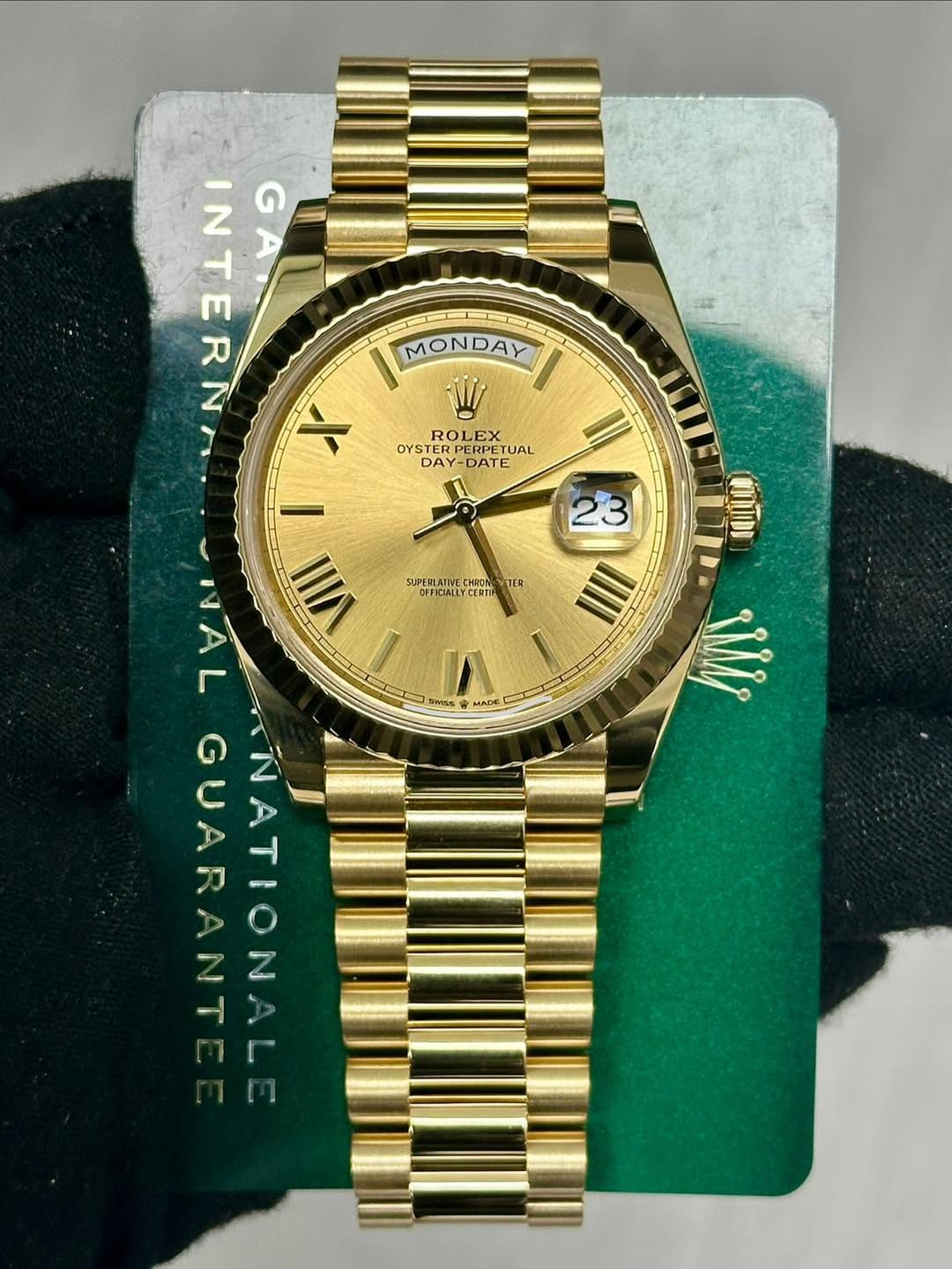 May be an image of wrist watch and text that says 'MONDAY ROLEX EX OYSTER STA-DATTUAL A. DAY-DATE የውያኝ። PERPETUA UAL DAY -DATE SUPERLATINE CERTIF TER ME M IN G INTERN I NALGUARANT…