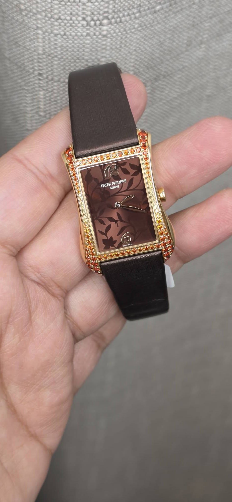 May be an image of digital watch and text