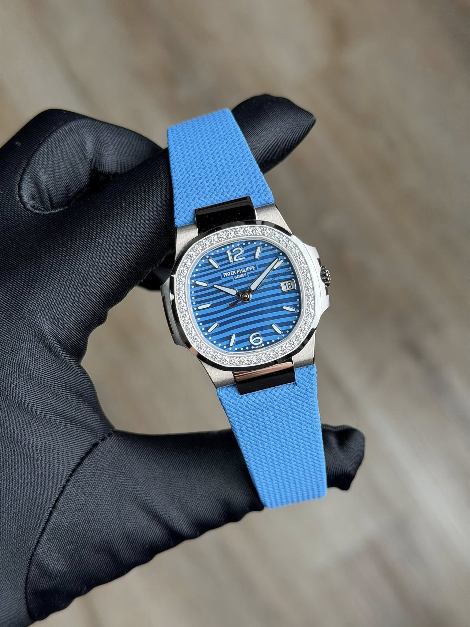 May be an image of wrist watch and text