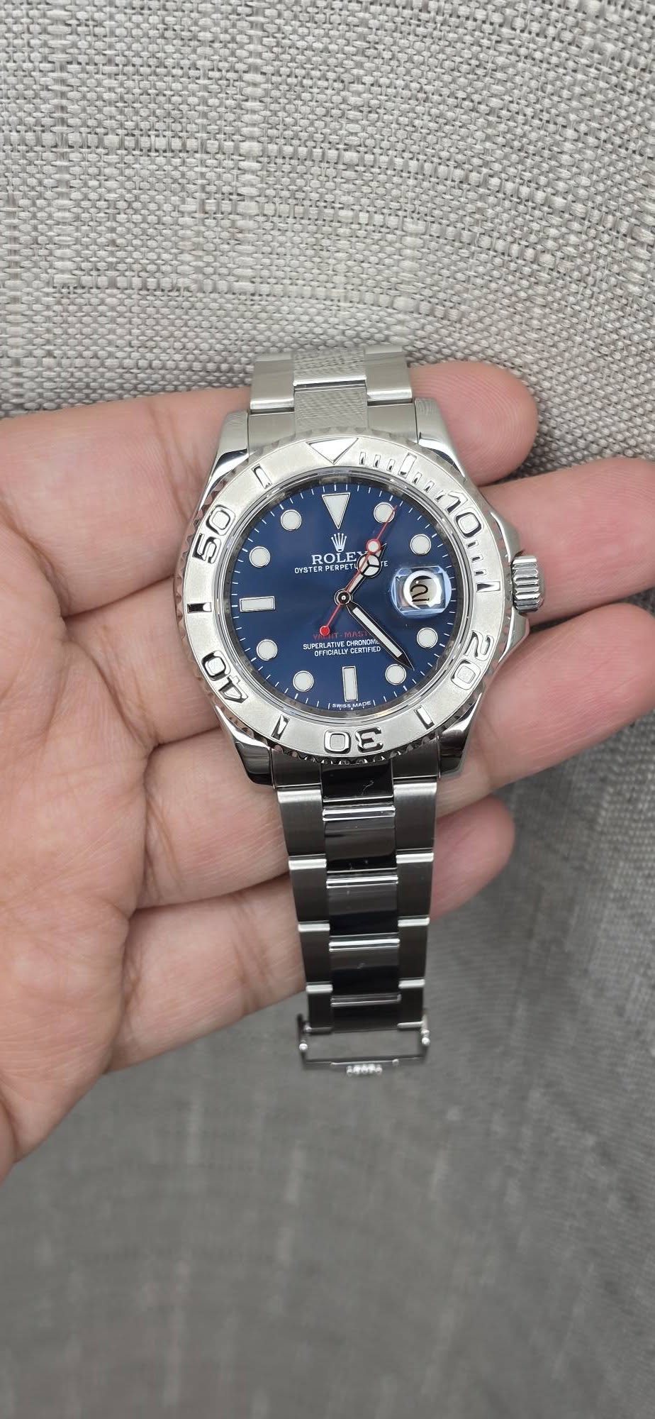 May be an image of wrist watch and text