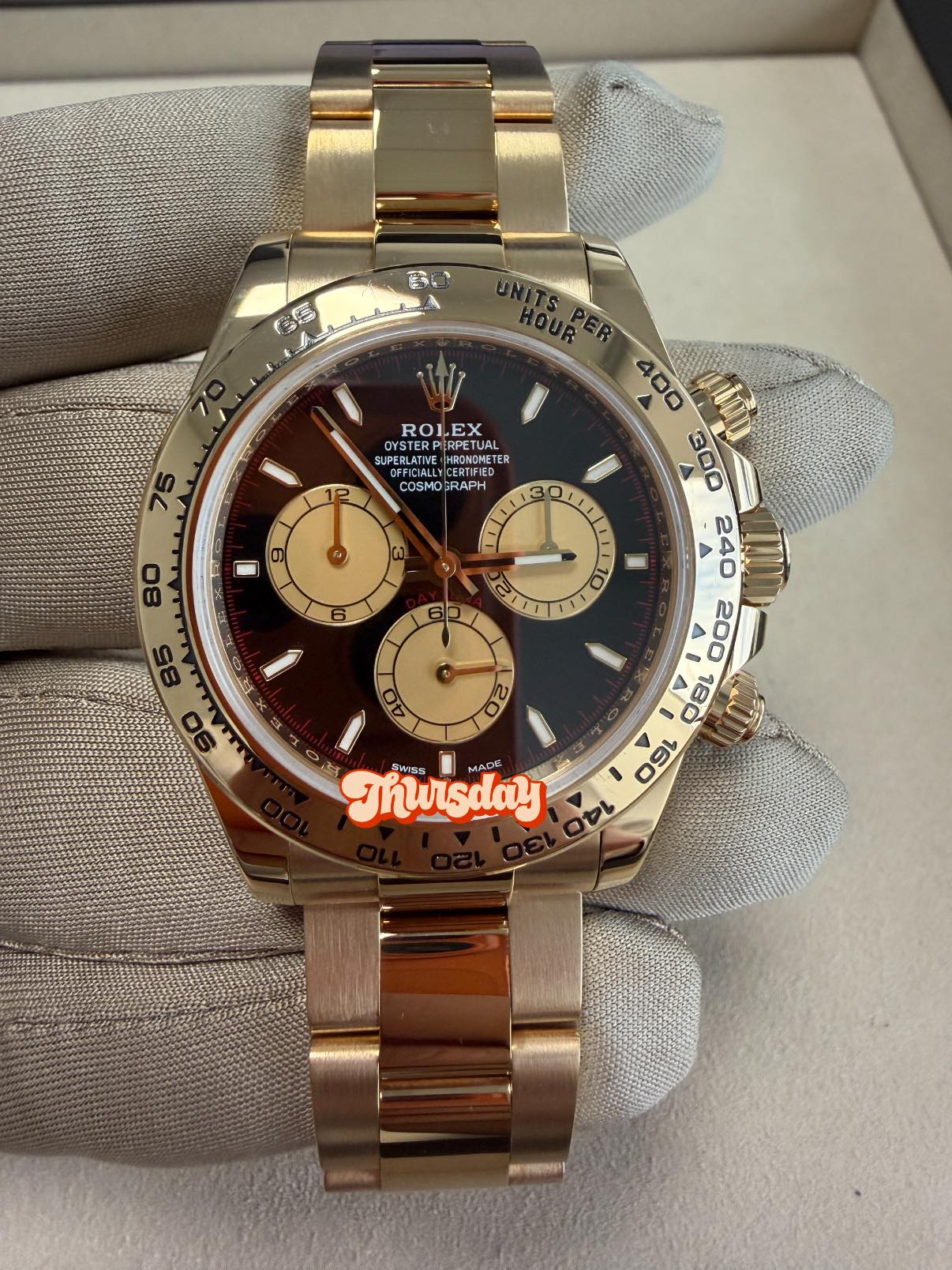 May be an image of wrist watch and text