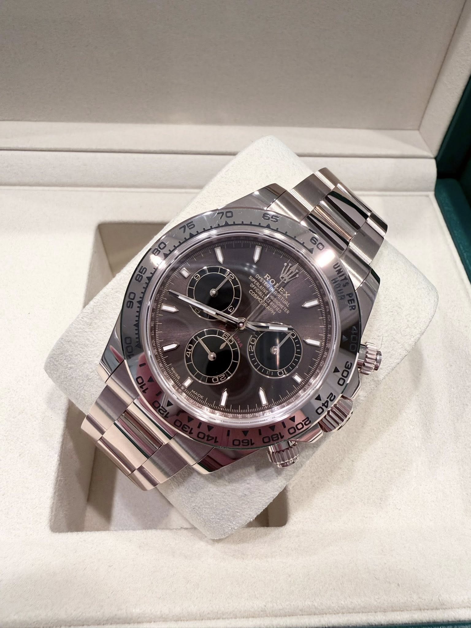 May be an image of wrist watch and text