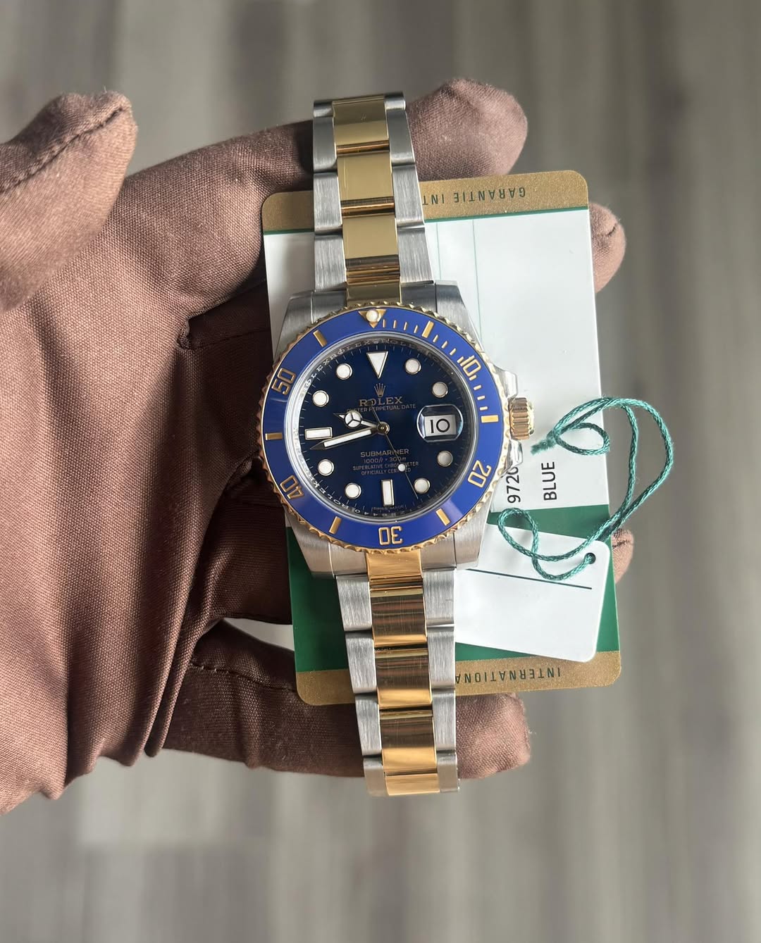 May be an image of wrist watch and text