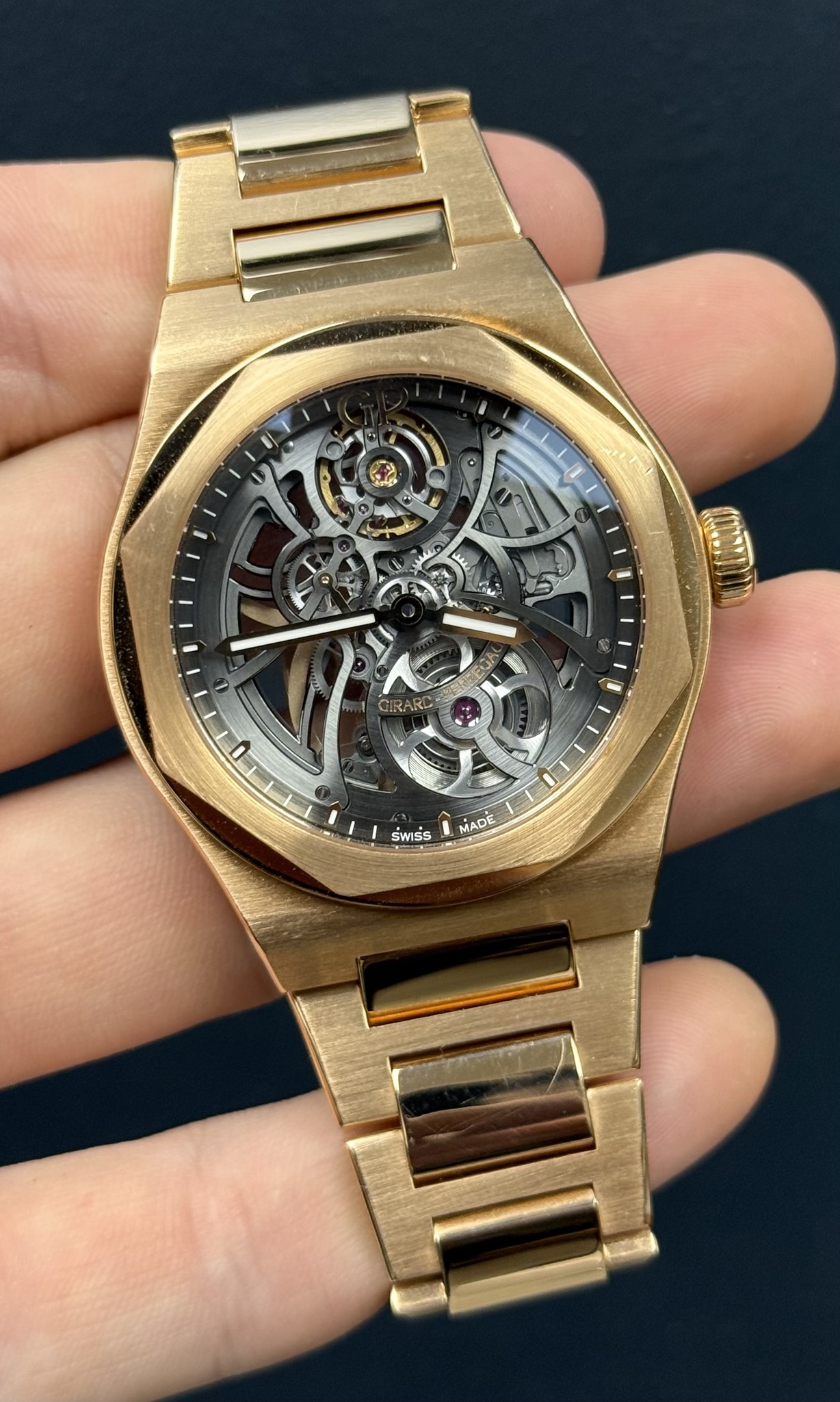 May be an image of wrist watch and text
