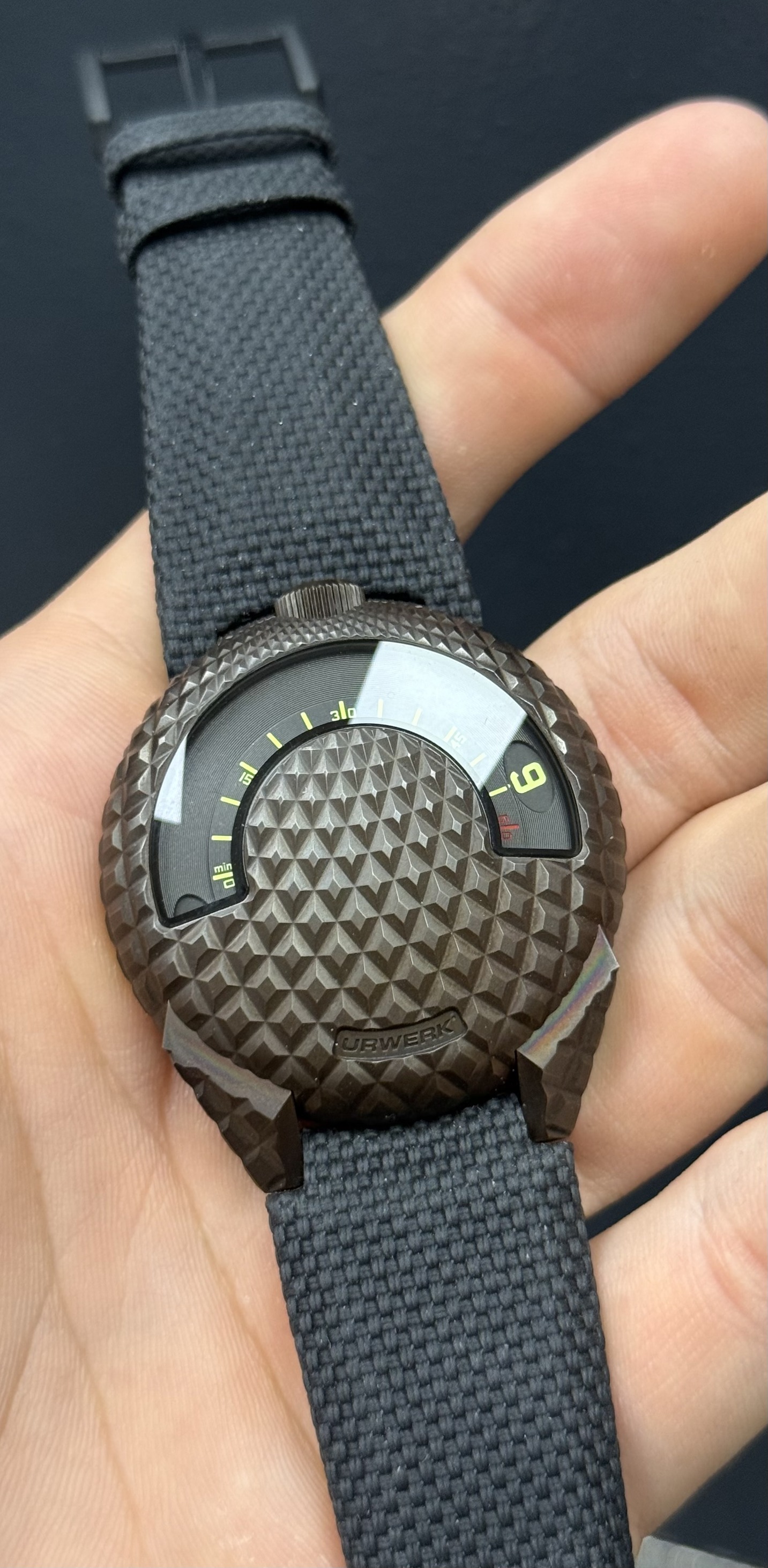 May be an image of digital watch and text