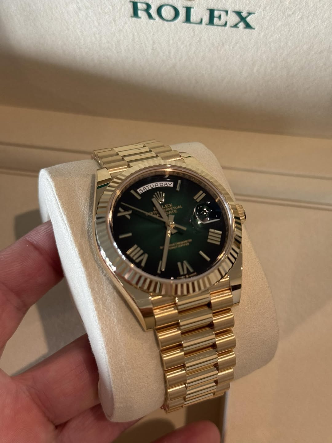 May be an image of wrist watch and text that says 'ROLEX SATURDAY'