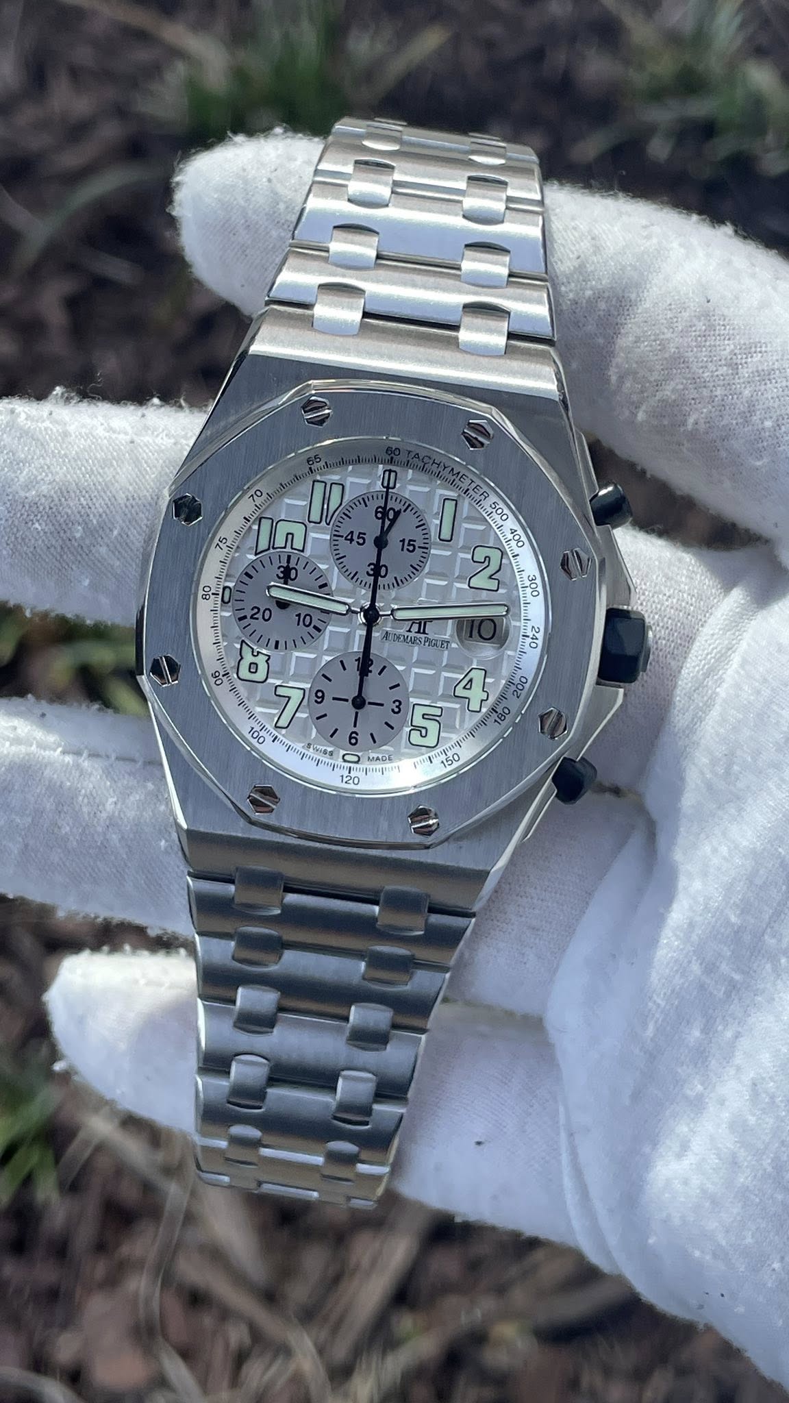 May be an image of wrist watch and text