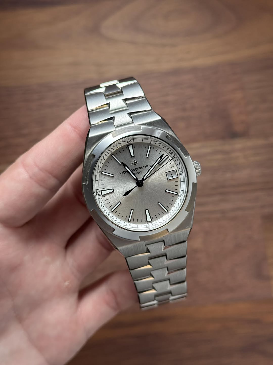 May be an image of wrist watch and text