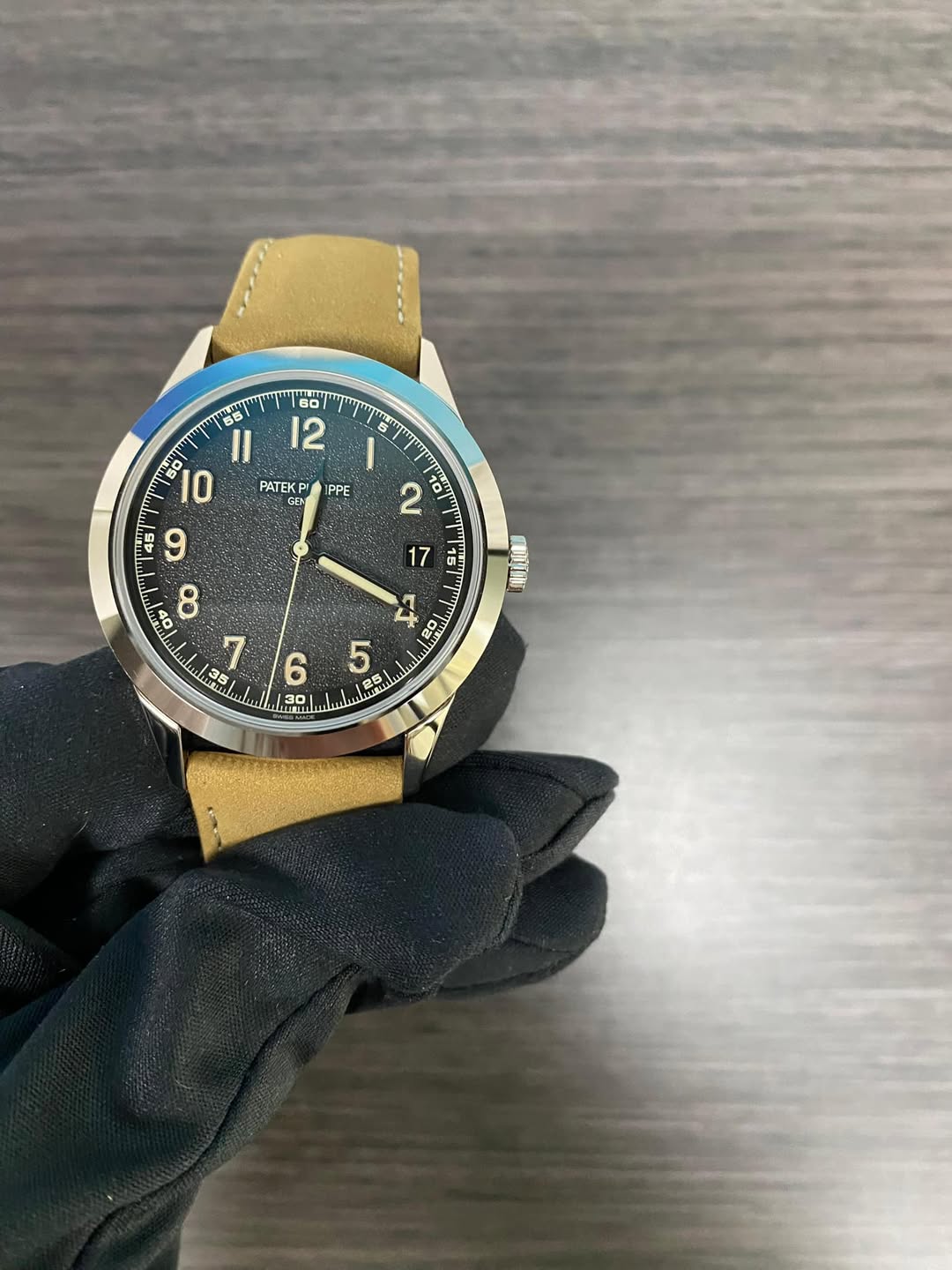May be an image of wrist watch and text that says '60 12 PPE 2 55 lI 10 PATEK KP 45 9 20 AP ထ 7 35 0 取動師 17 15 دي 6 5 30 wranl'