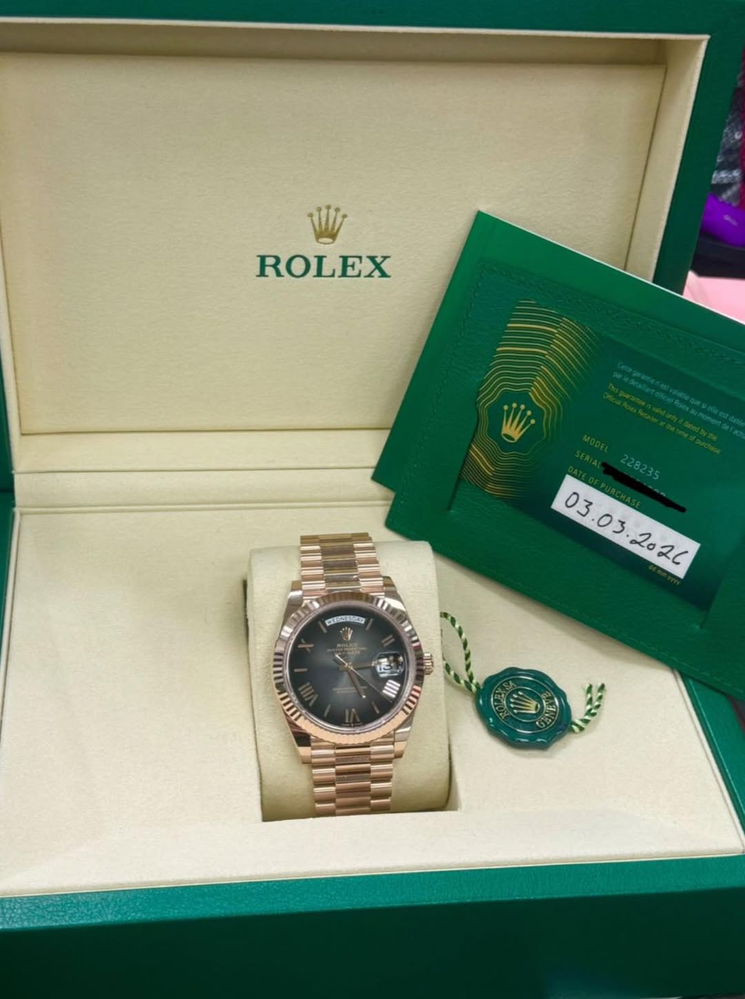 May be an image of wrist watch and text