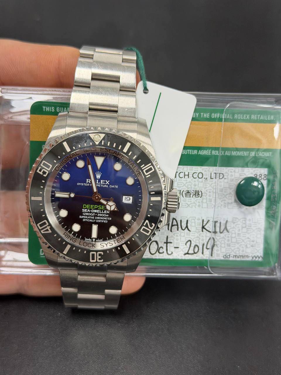May be an image of wrist watch and text