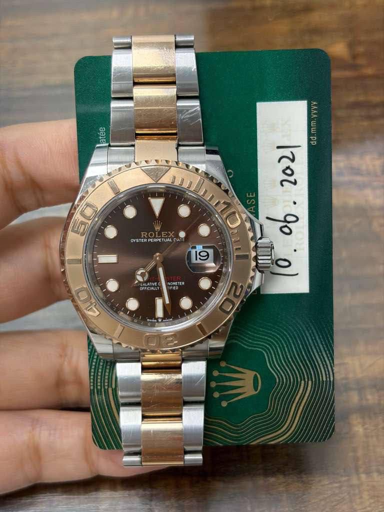 May be an image of wrist watch and text that says 'atee MЛЛa•wwpp שש ሊለለለ 1202 O 1202.900 go 50 OYST PER YSTERPERPE OYSTERPERPETUAL RPE TUAL PE 19 DFFICIALL NOMETE 4.0'