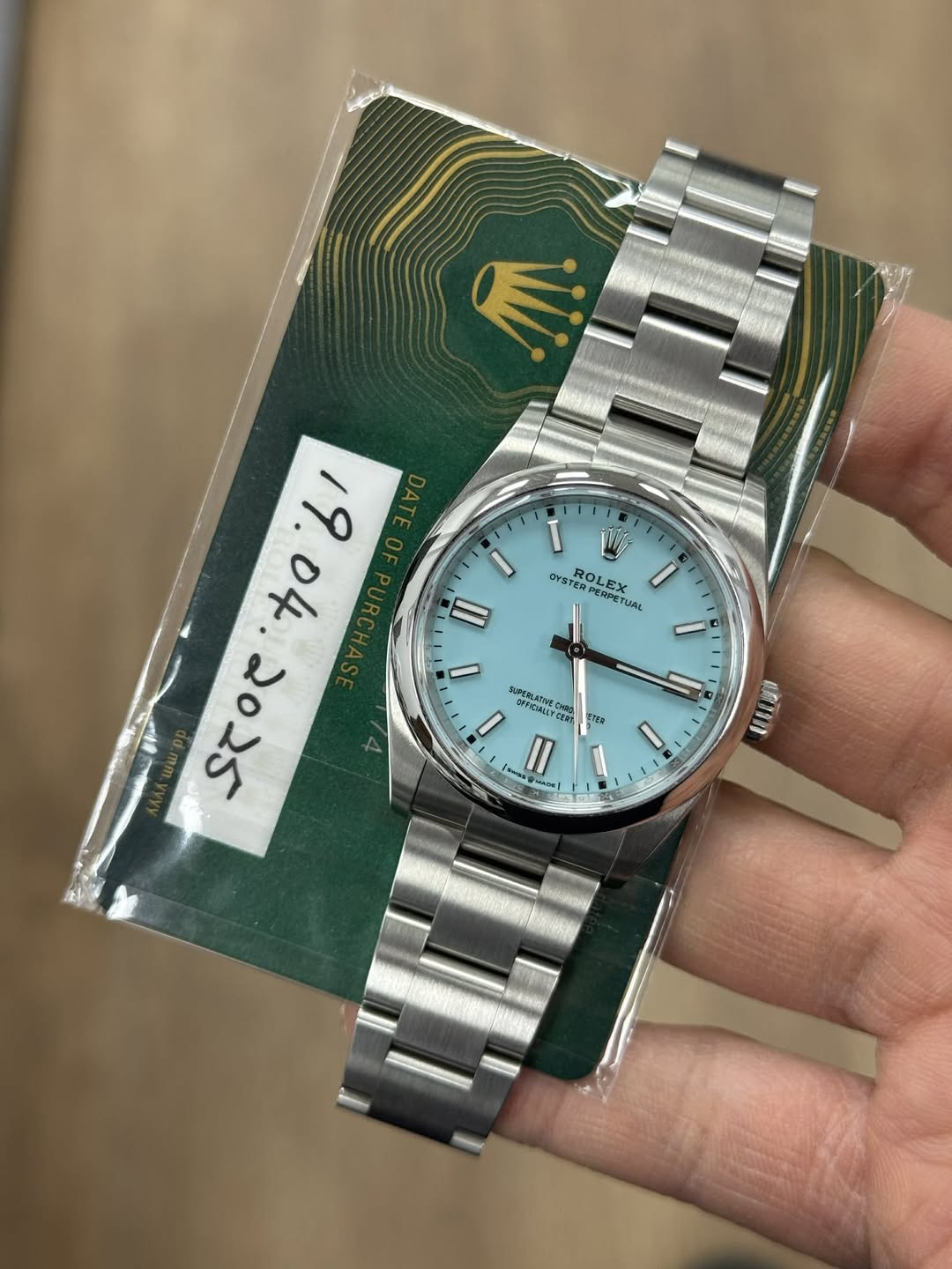 May be an image of wrist watch and text